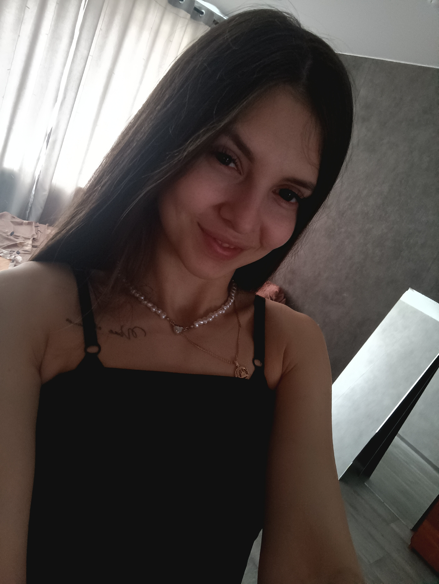 Woman takes multiple selfies in hallway over morning hours