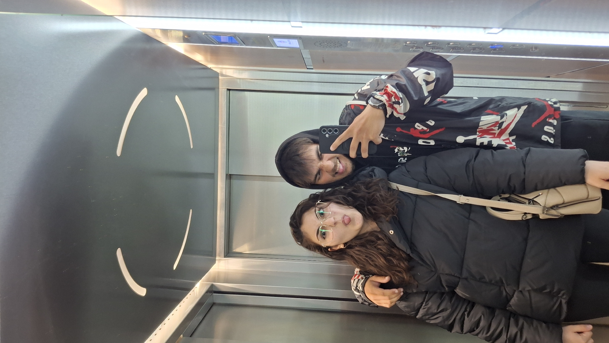 Elevator encounter and tulip bouquet captured in Varna