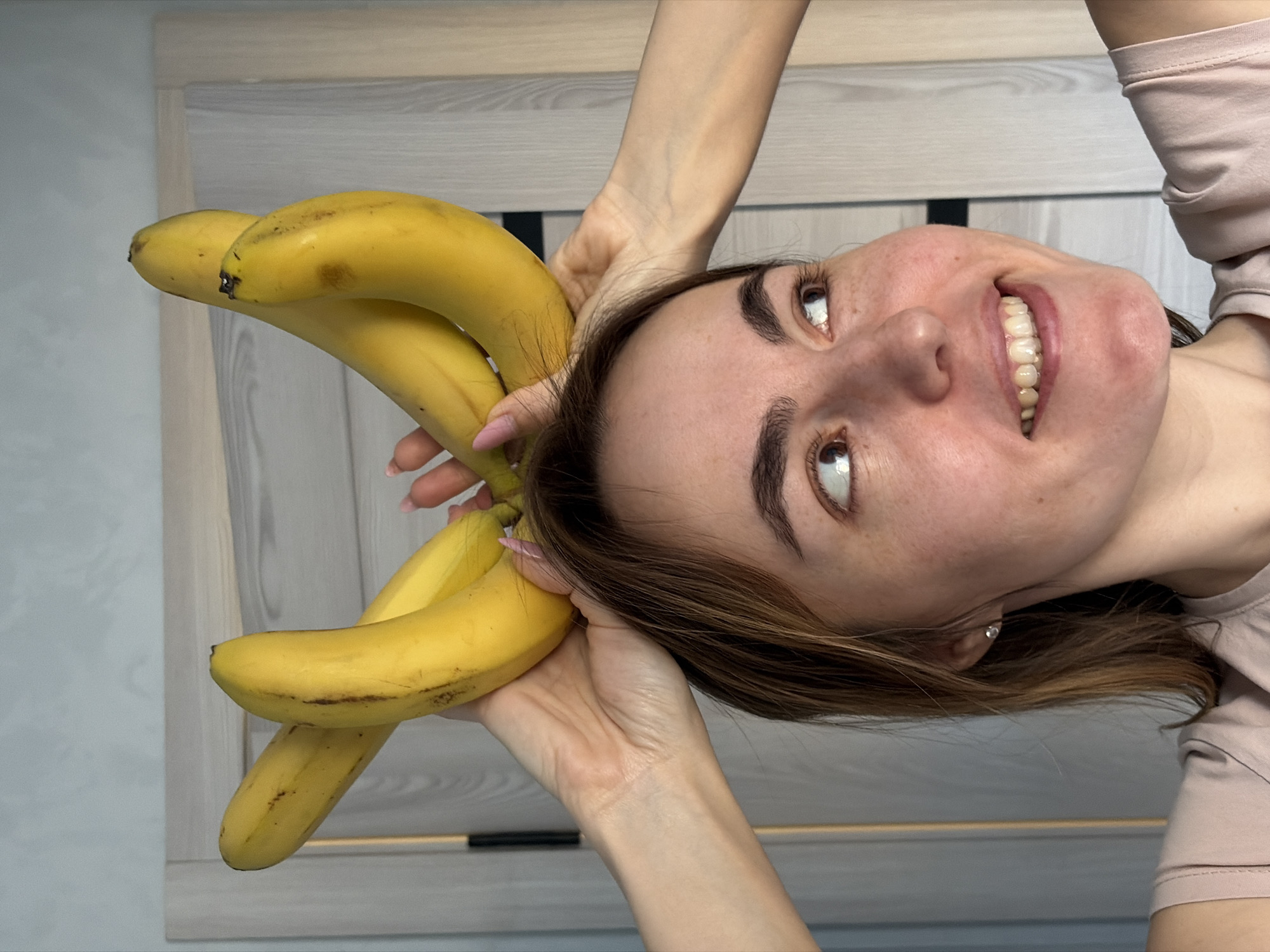 Woman poses with bananas in Sarapul, Russia