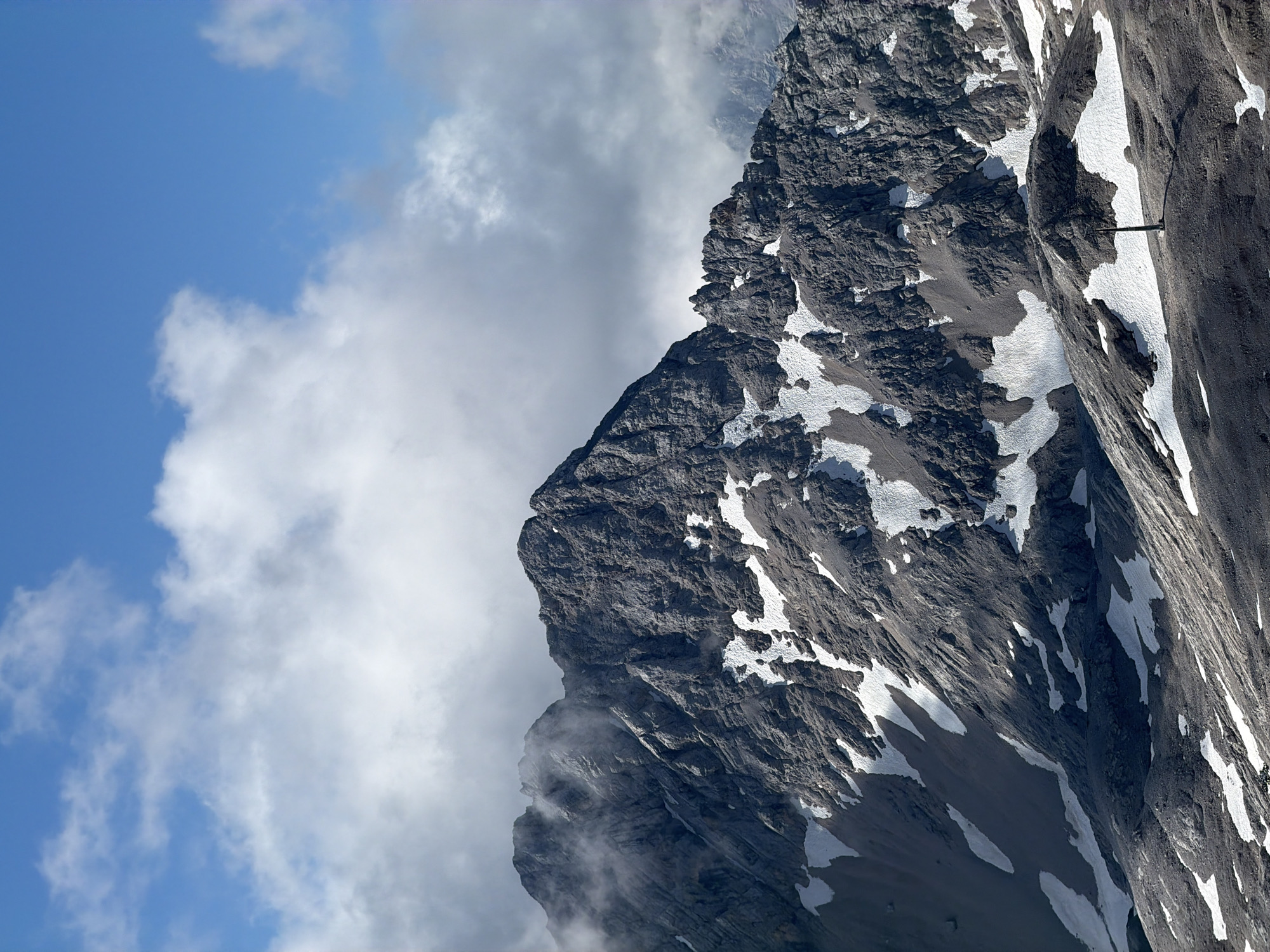 Hiking a rocky scree slope in the Austrian Alps