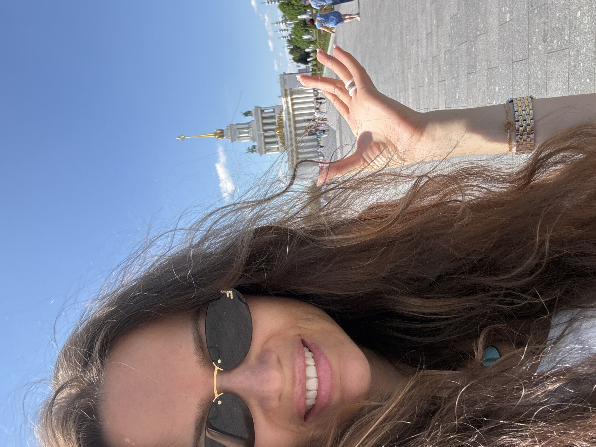 Exploring VDNKh's monuments and fountains on a sunny Moscow morning