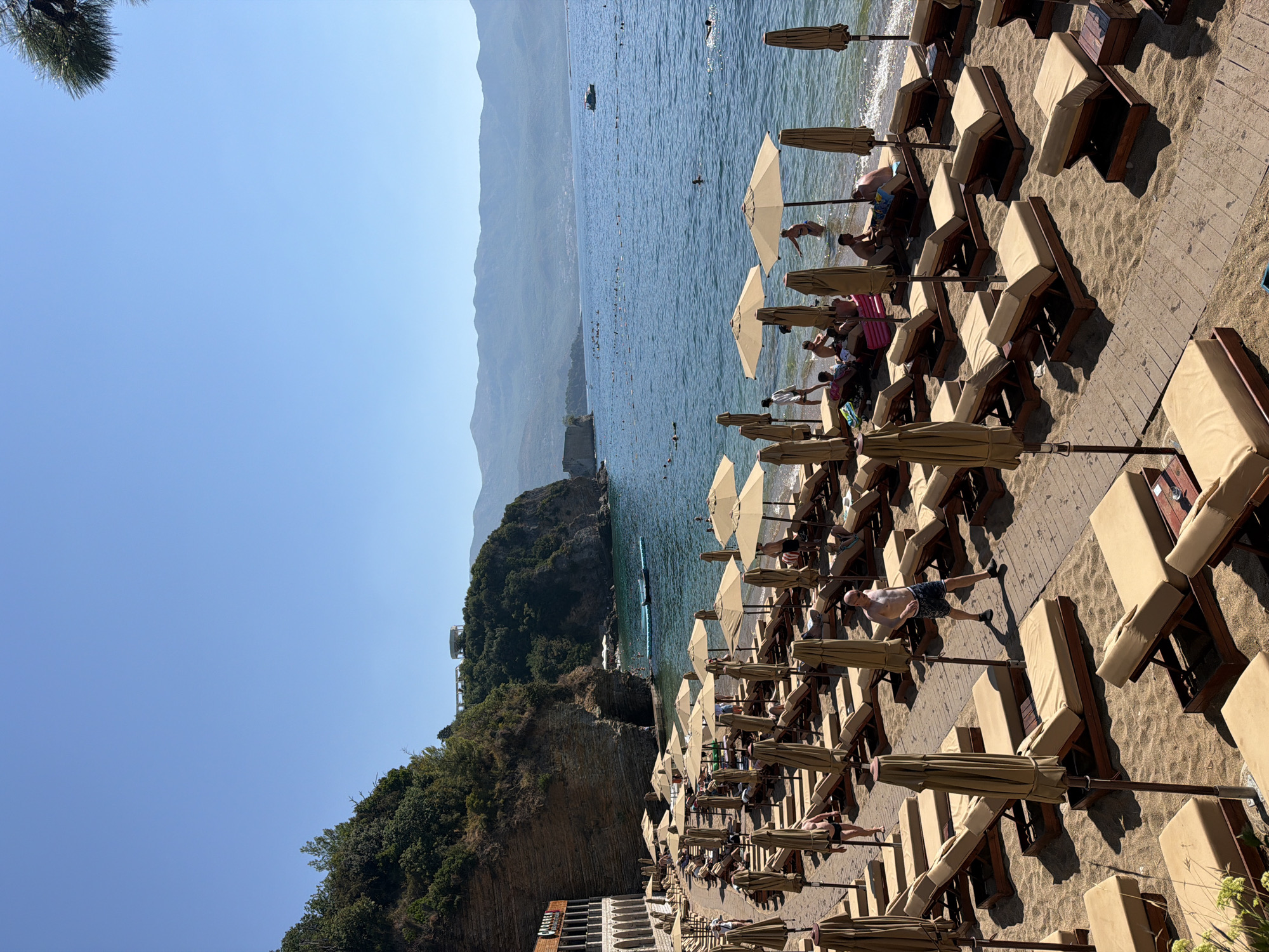 Busy summer morning at Budva's Mogren beach, Montenegro