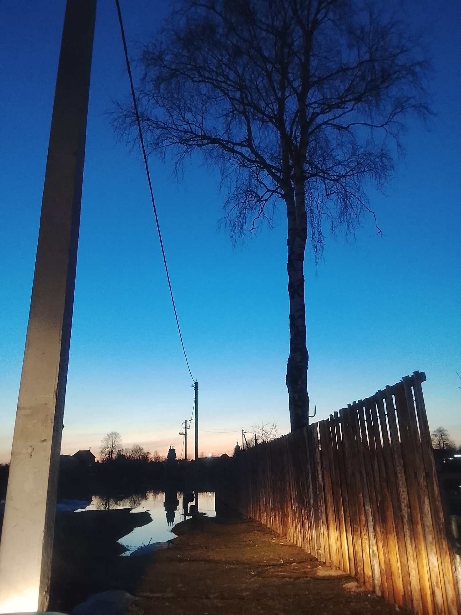 Evening drive through rural Russian village documented