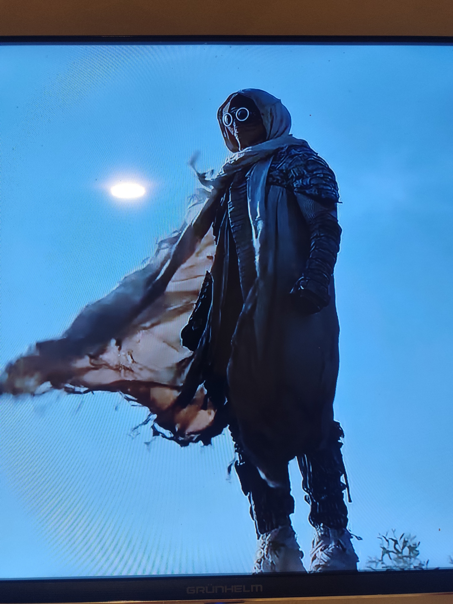 Eclectic visual mix: pyramids, ancient stone, costume, robot painting, spiderweb