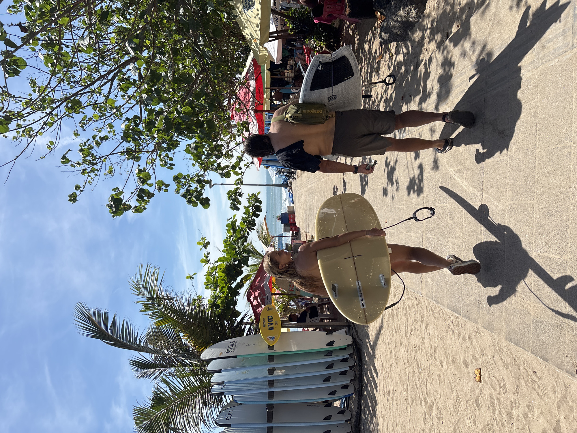 Early morning surf activity captured across Kuta beach