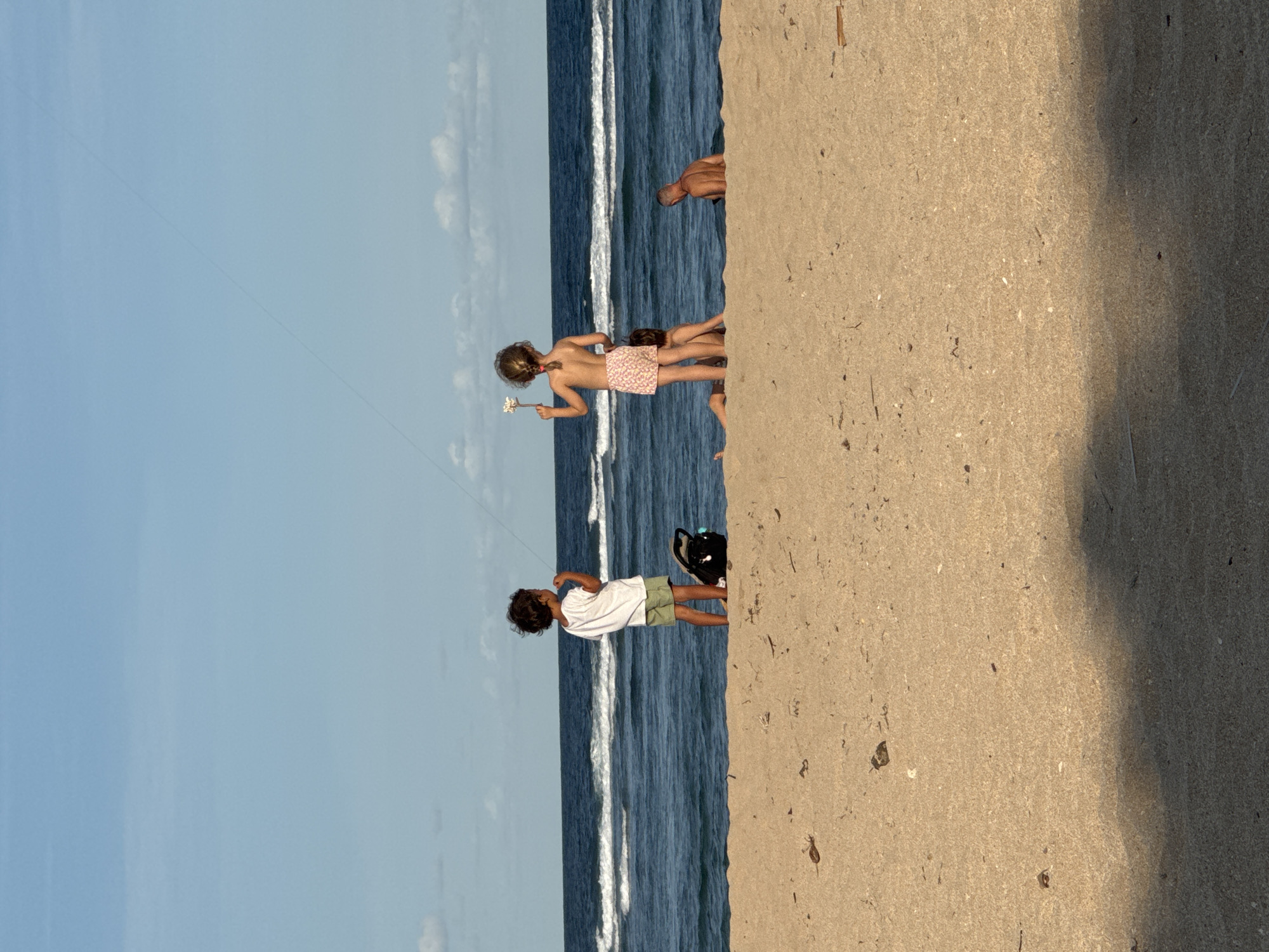 Beach wedding and morning activities observed in Kuta Selatan