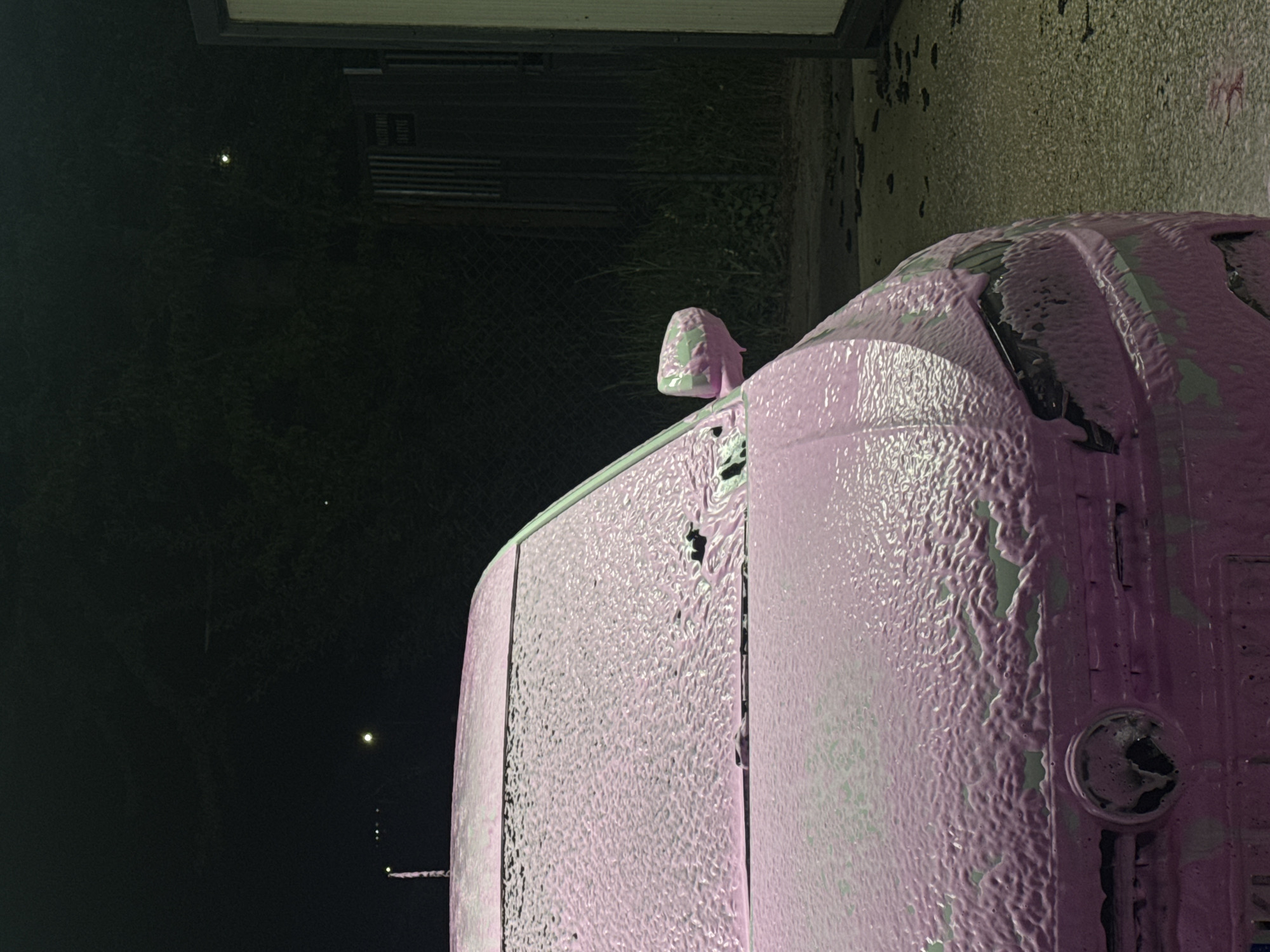 Car wash in progress at night in Dupnitsa, Bulgaria