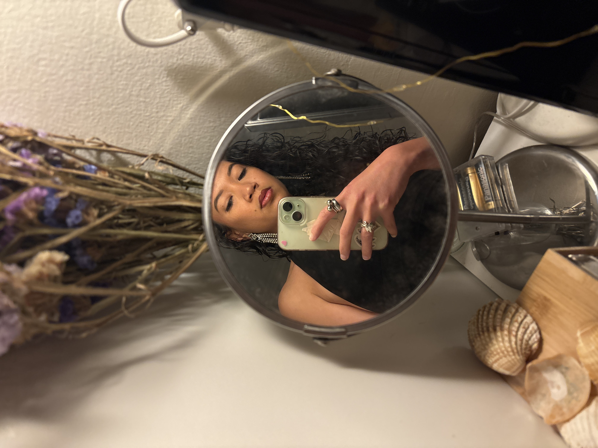 Person takes mirror selfie in Lisbon