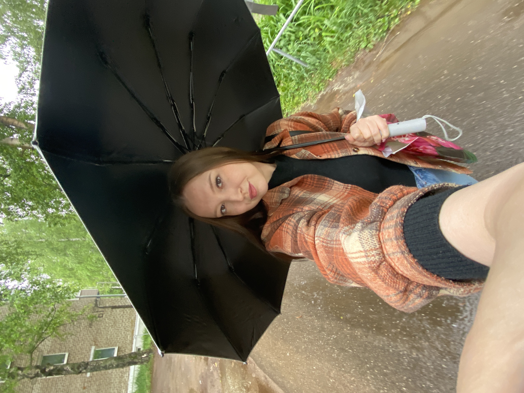 Woman documents rainy evening routine in Chaikovsky, Russia