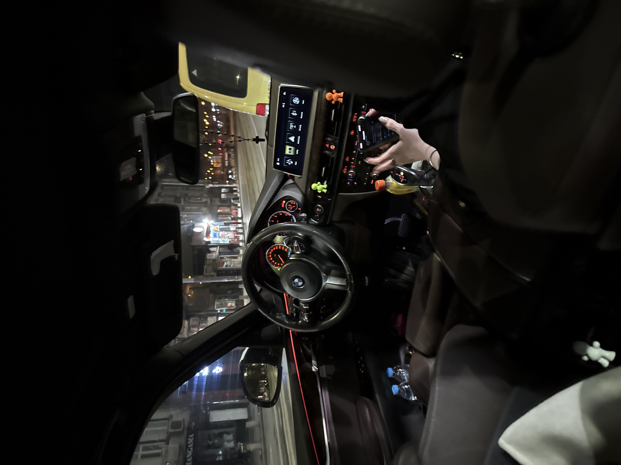 Driver documents BMW interior view on Sofia street
