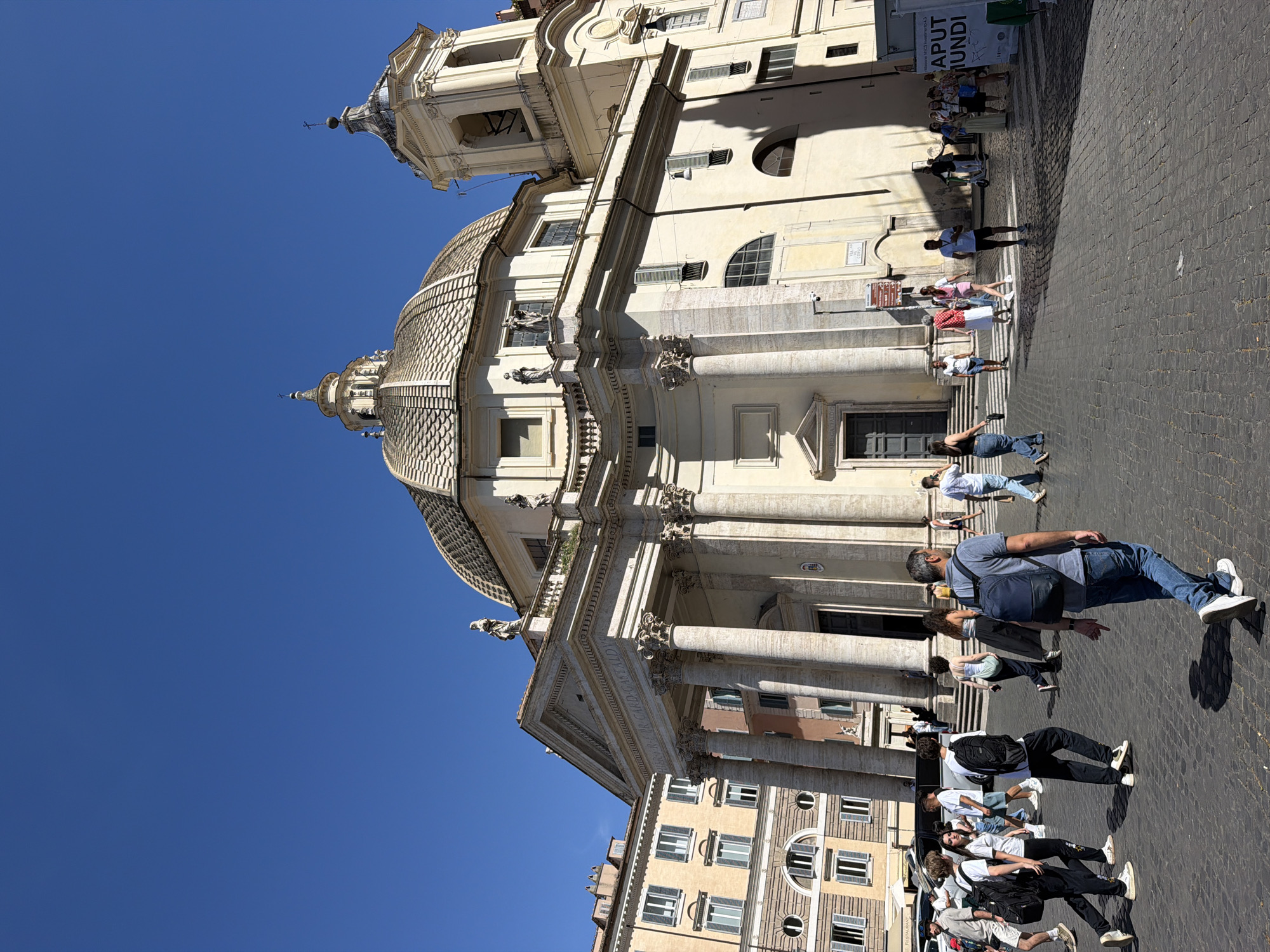 Tourist documents sunny afternoon stroll through historic Rome streets