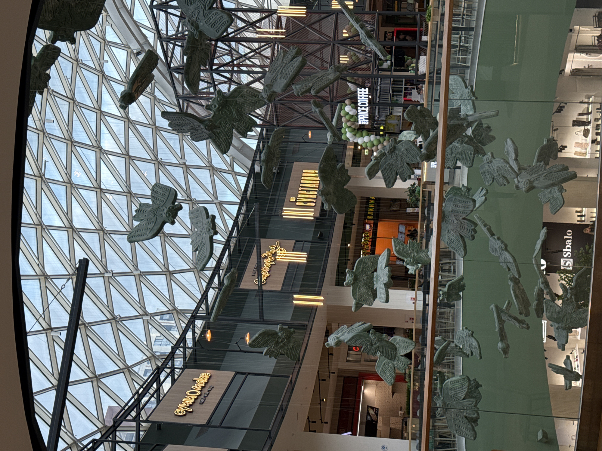 Shopping mall scenes and portraits documented in Perm