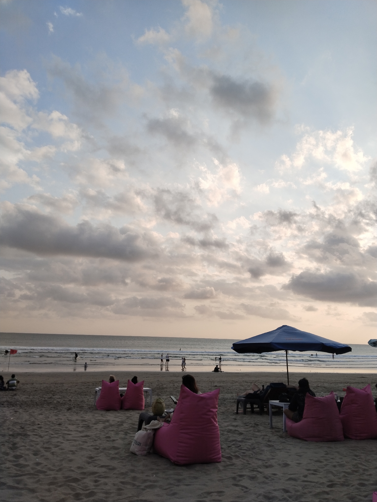 Lazy afternoon on Kuta Beach as sunset rolls in