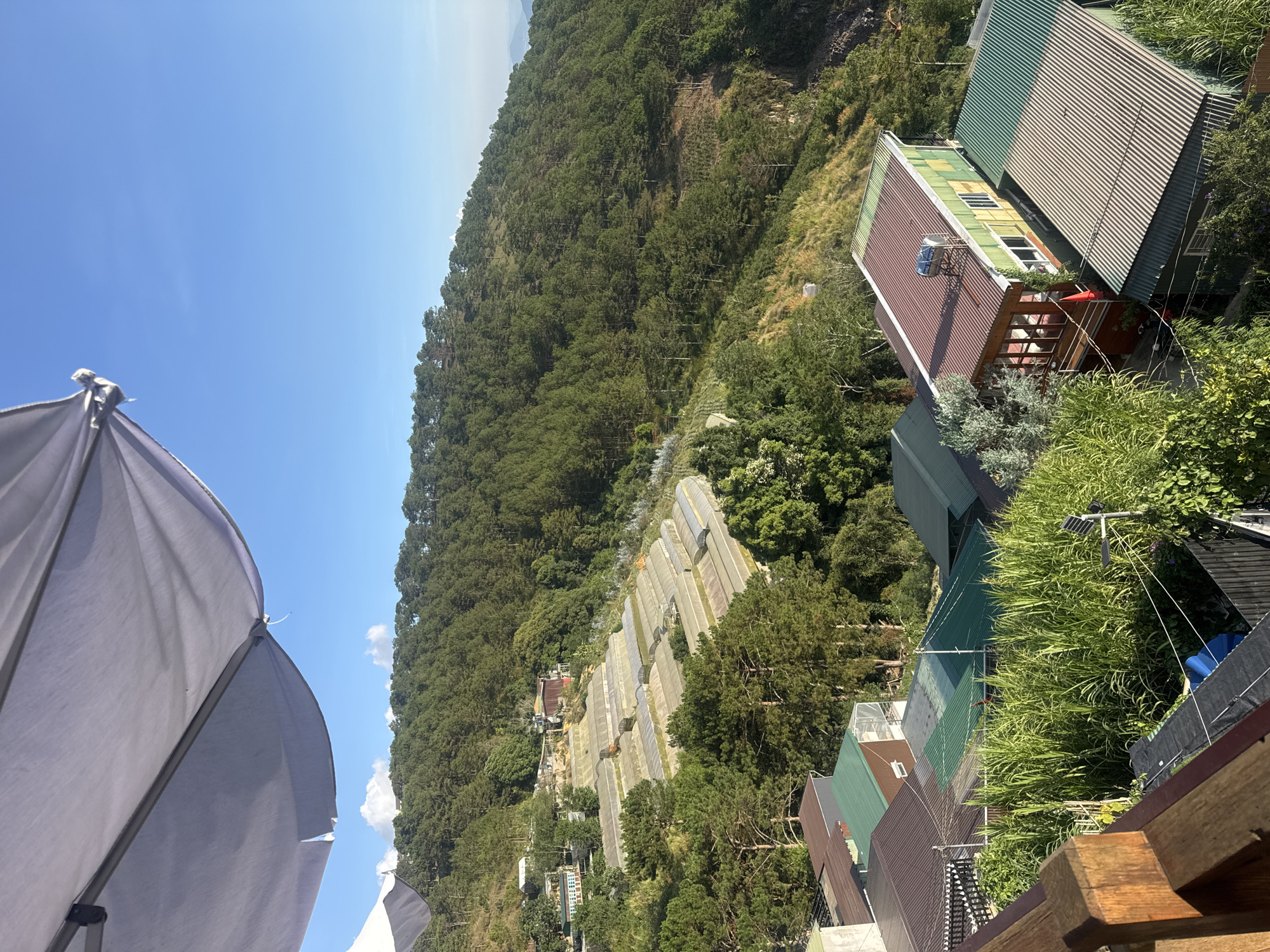 Quiet morning balcony moment overlooking Da Lat mountains
