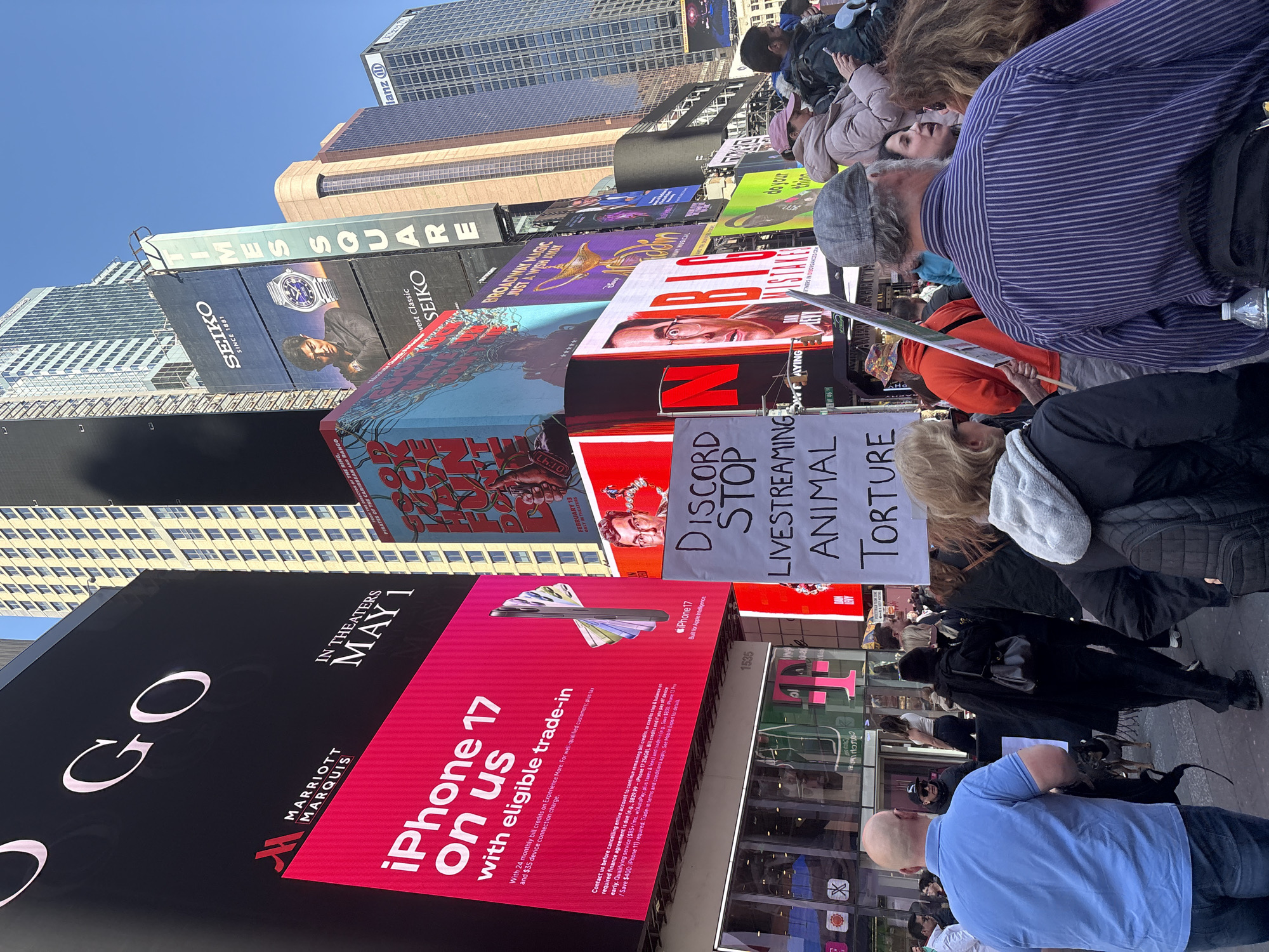 Costumed performers, protest converge in Times Square Saturday afternoon