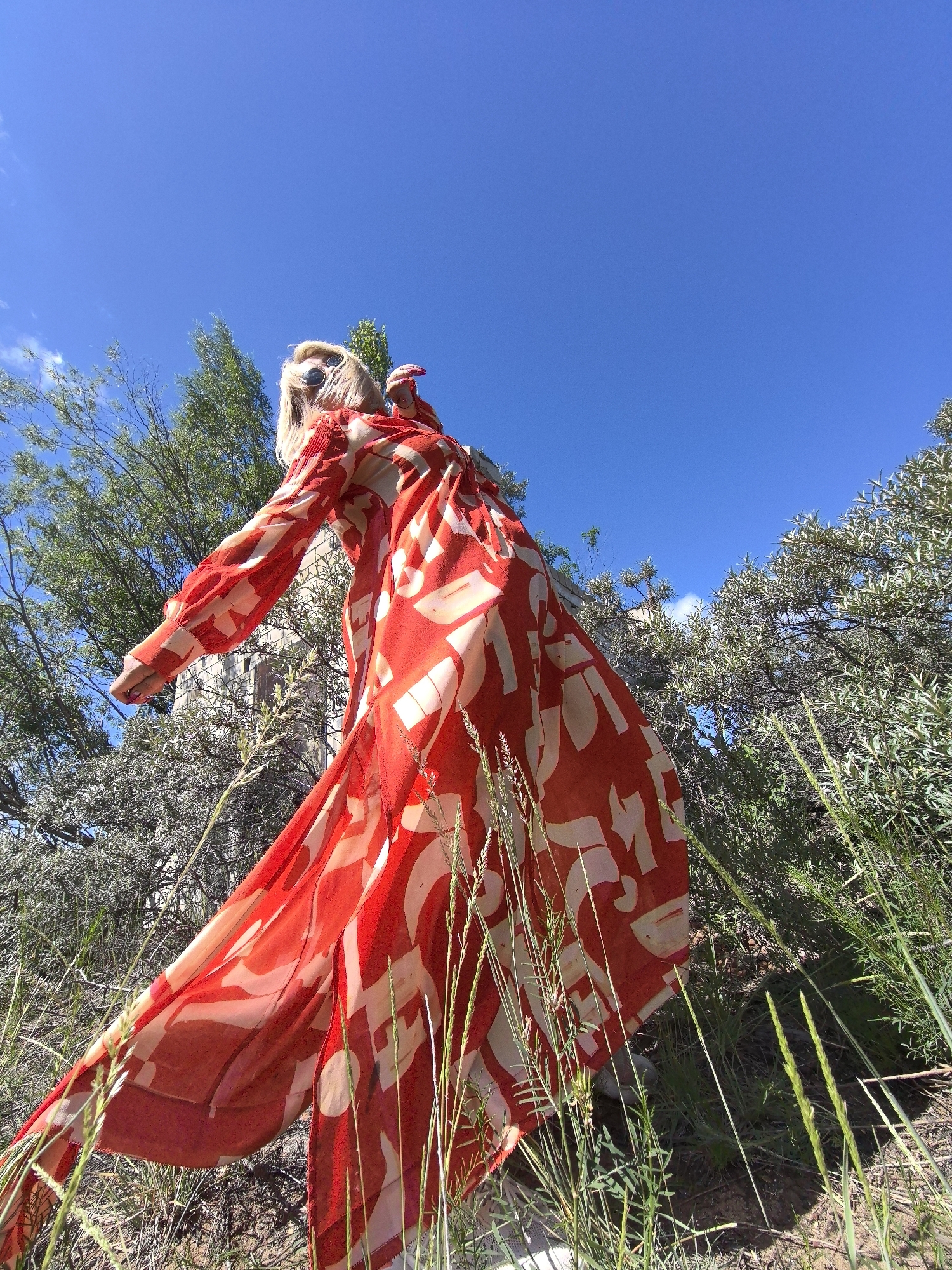 Woman photographs herself around historic Noviy, Russia locations