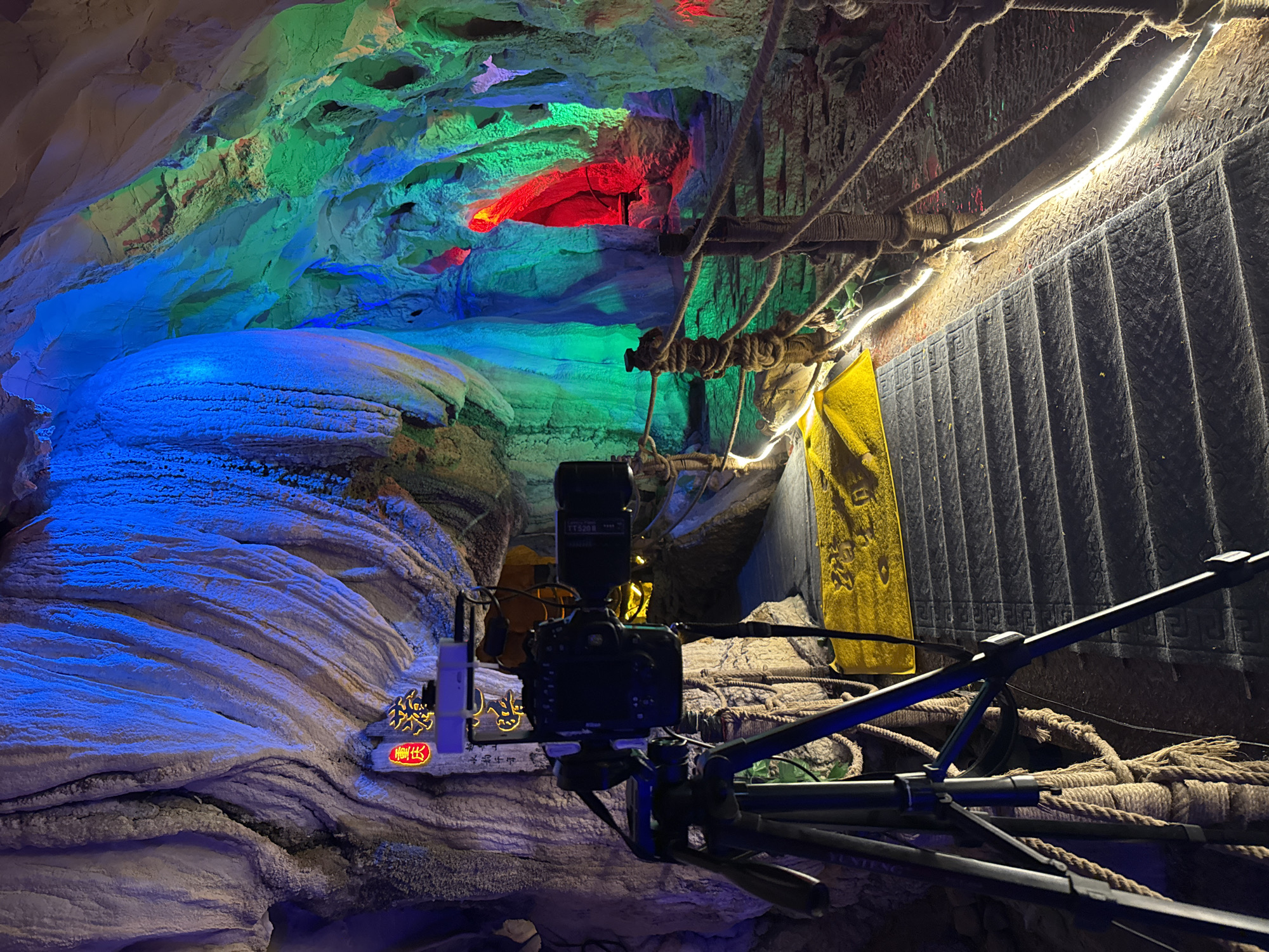 Tourist explores illuminated caves and scenic walkways in Zhuoshui