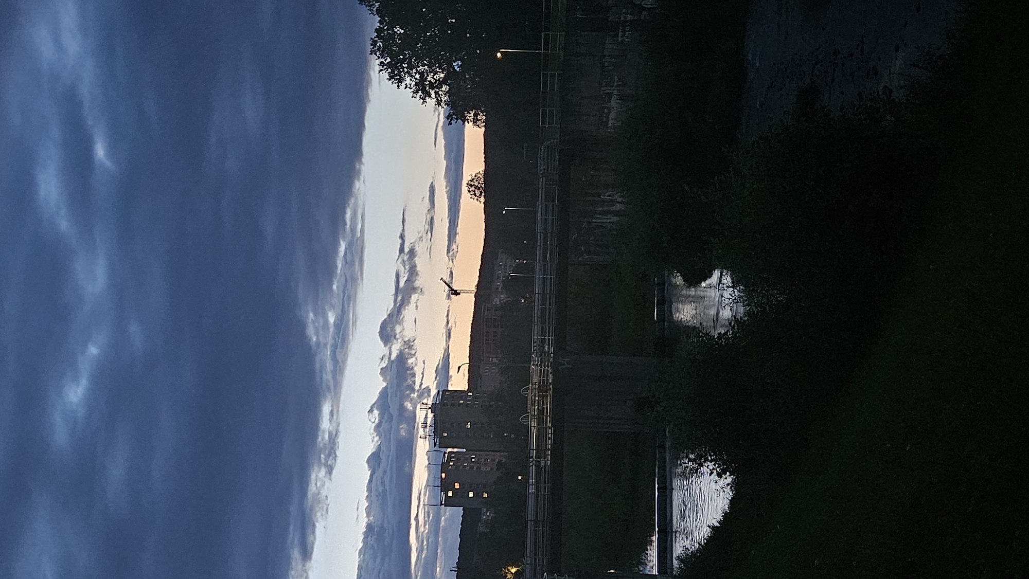 Dusk settles over Prešov's riverfront and residential streets