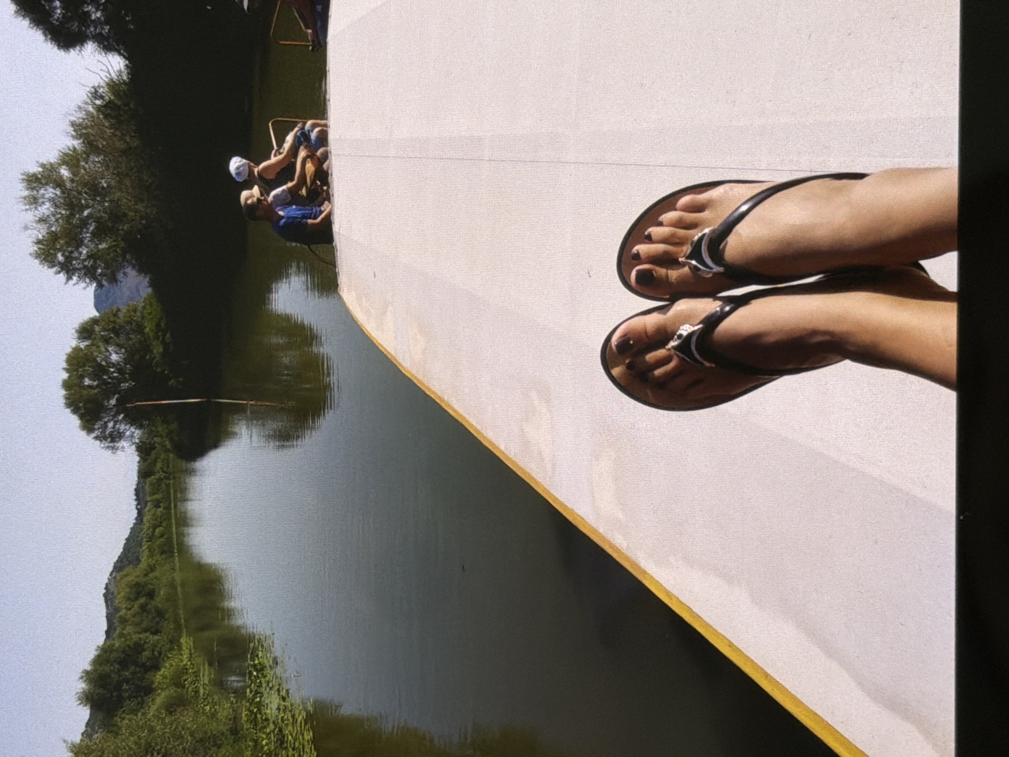 Boat trip through calm waterways beneath green hills
