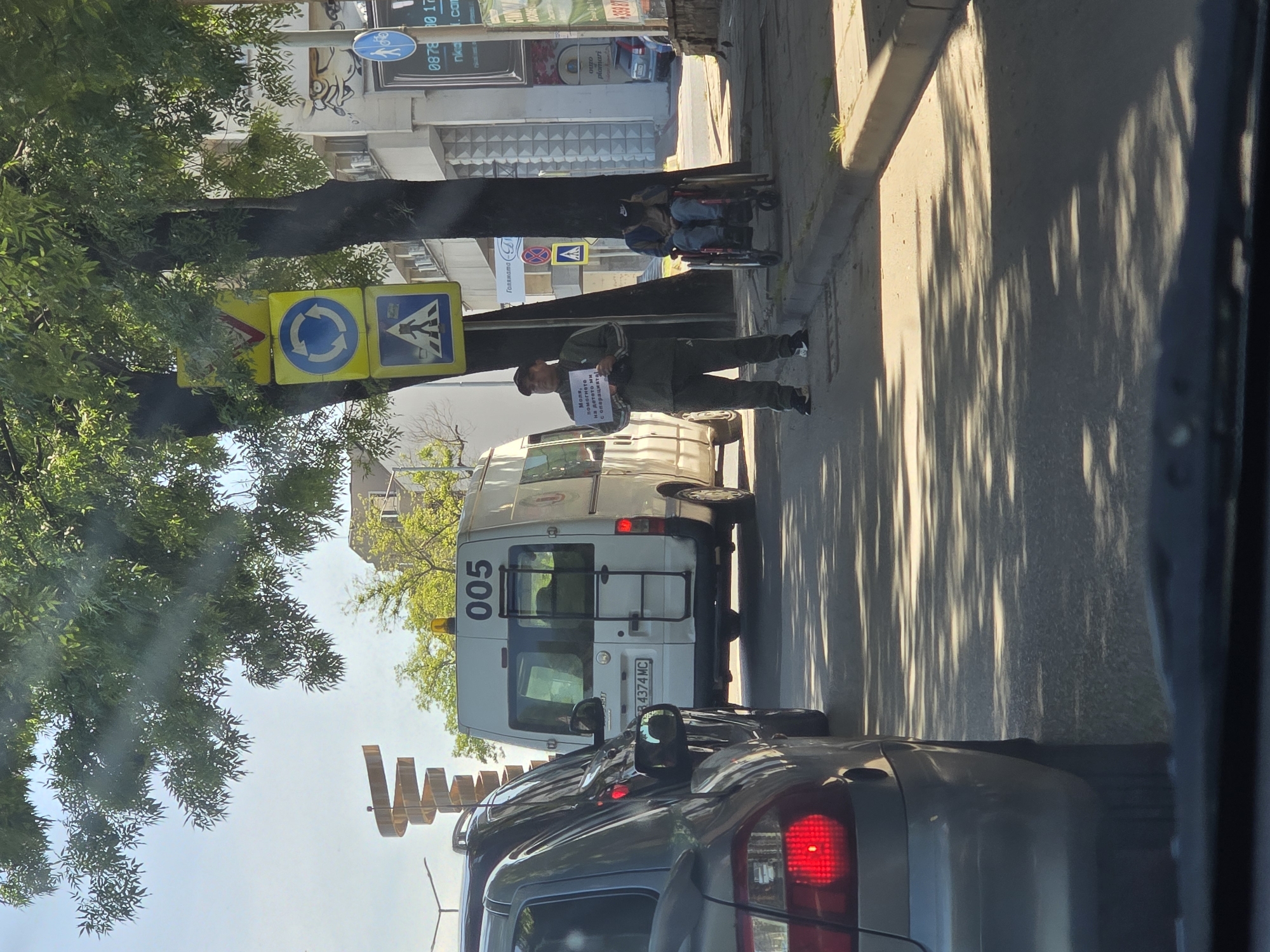 Street scenes documented in Plovdiv, Bulgaria featuring van and monuments