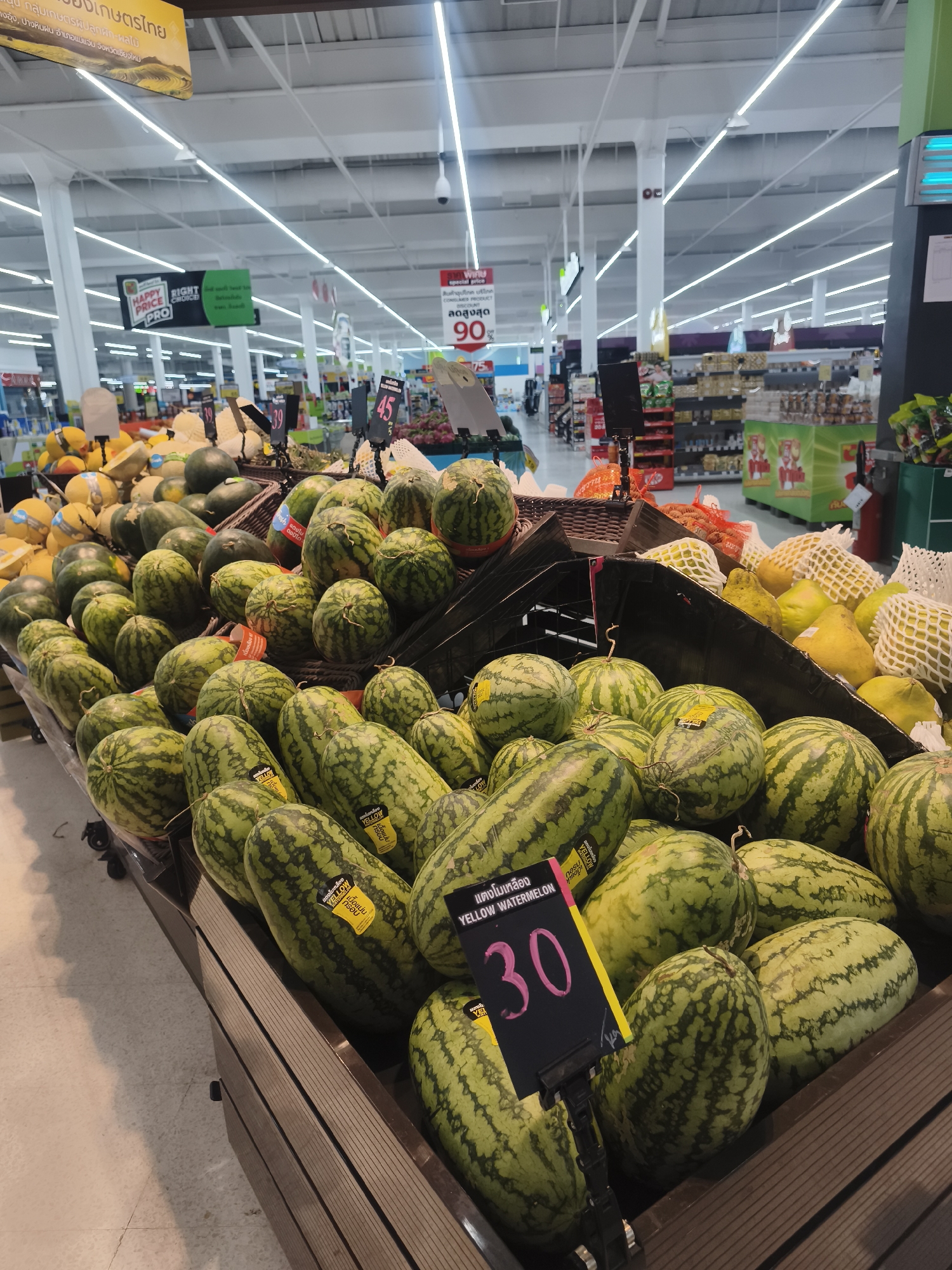 Thai retail stores documented with produce, goods displays