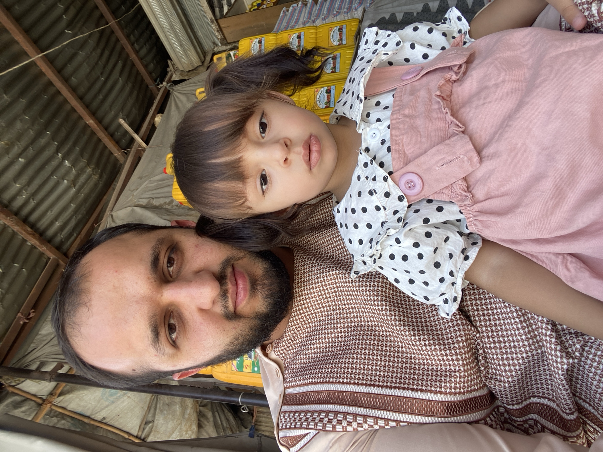 Two quick shots from a Kandahar market, seconds apart