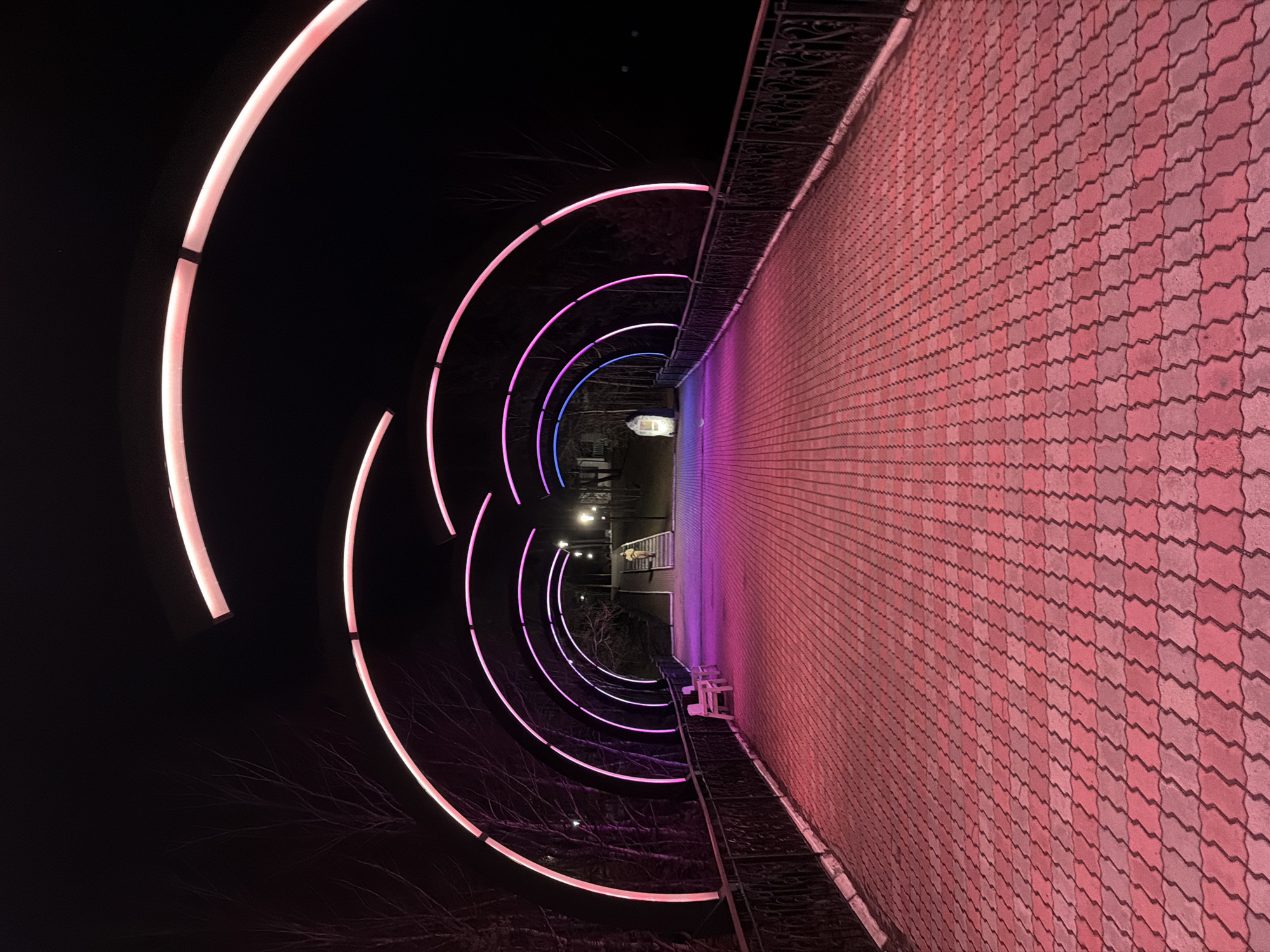 Nighttime documentation of illuminated walkway and monument in Sliznevo