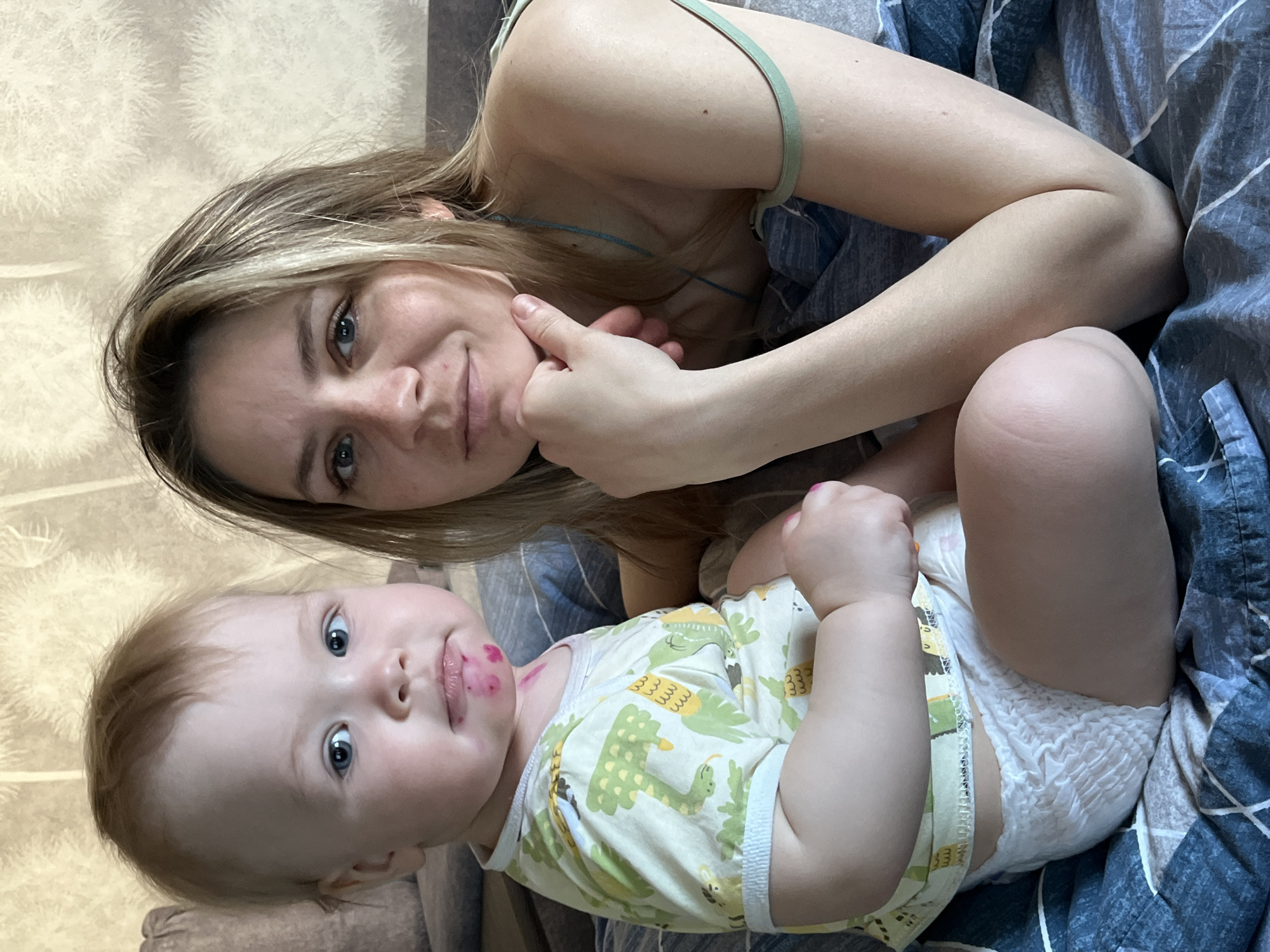 Mother and baby take winter selfies in Russian forest