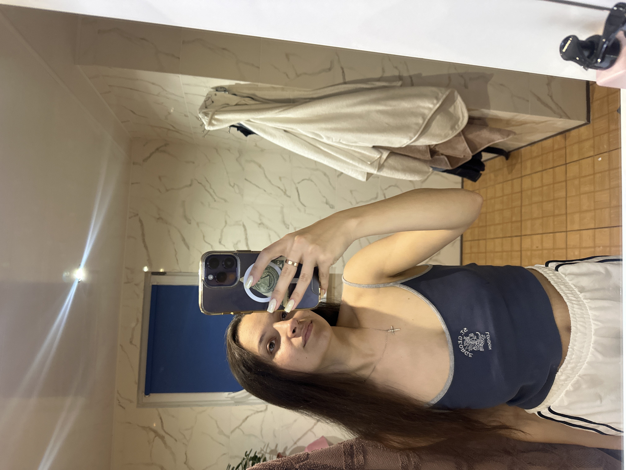 Mirror selfie series in a tiled bathroom, Postoyata