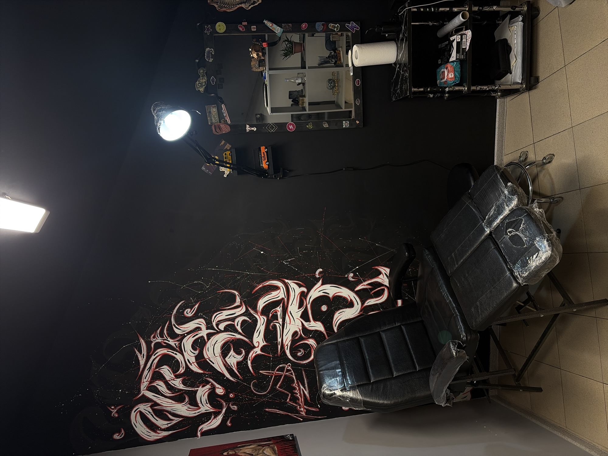 Tattoo studio interior and glassblower painting documented in Yerevan