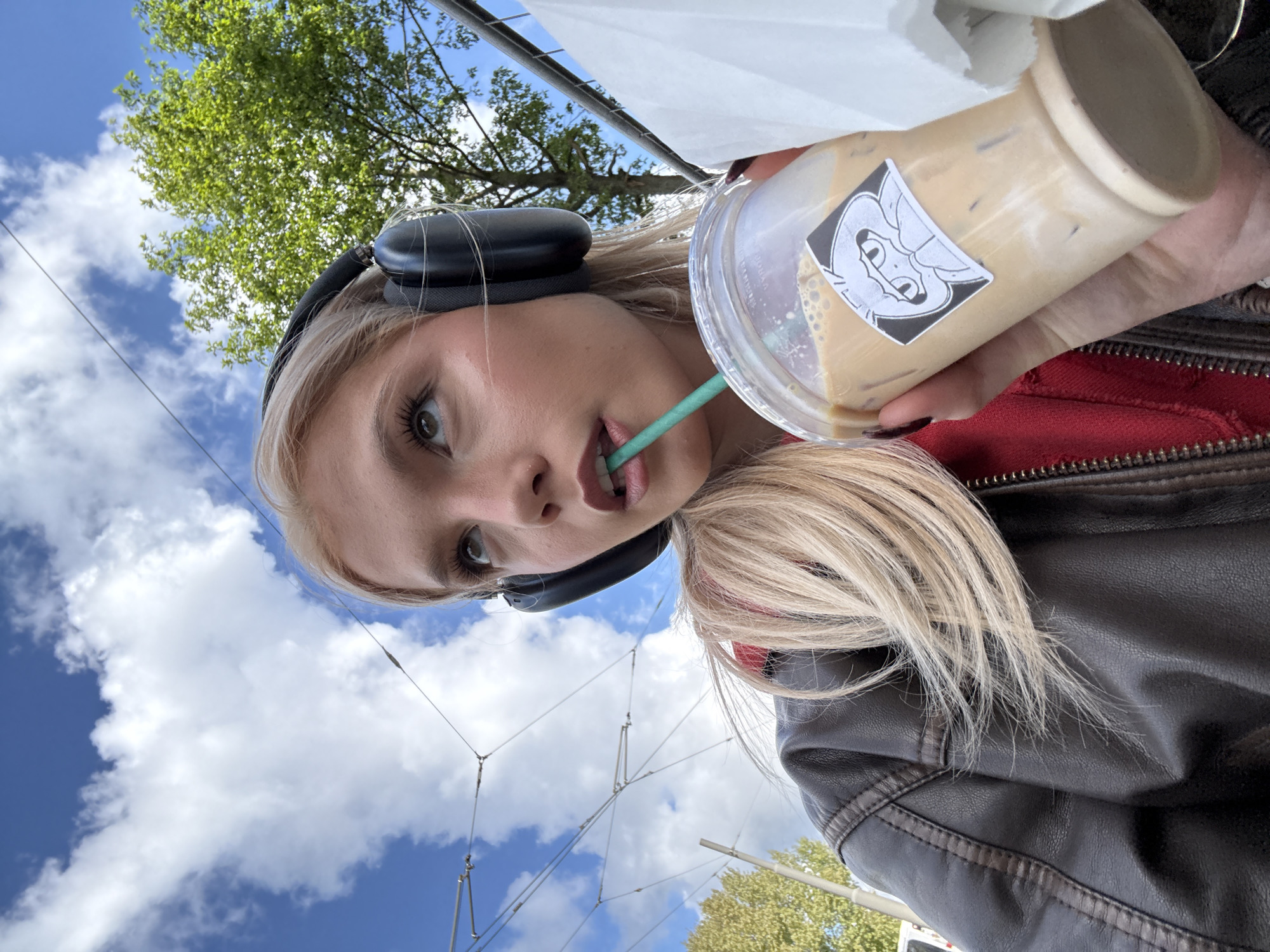 Woman enjoys morning coffee break in Antwerp