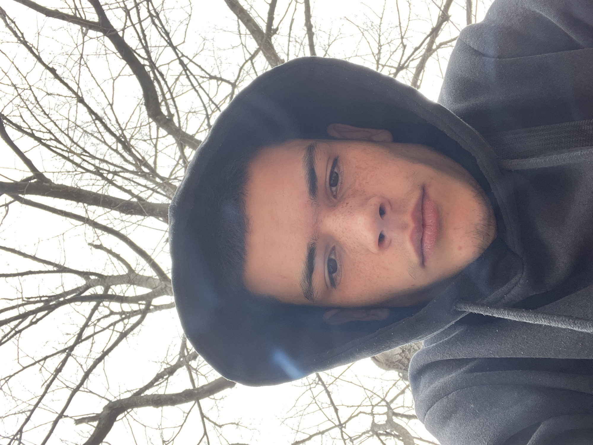 Young man takes selfies, smokes during grocery store visit
