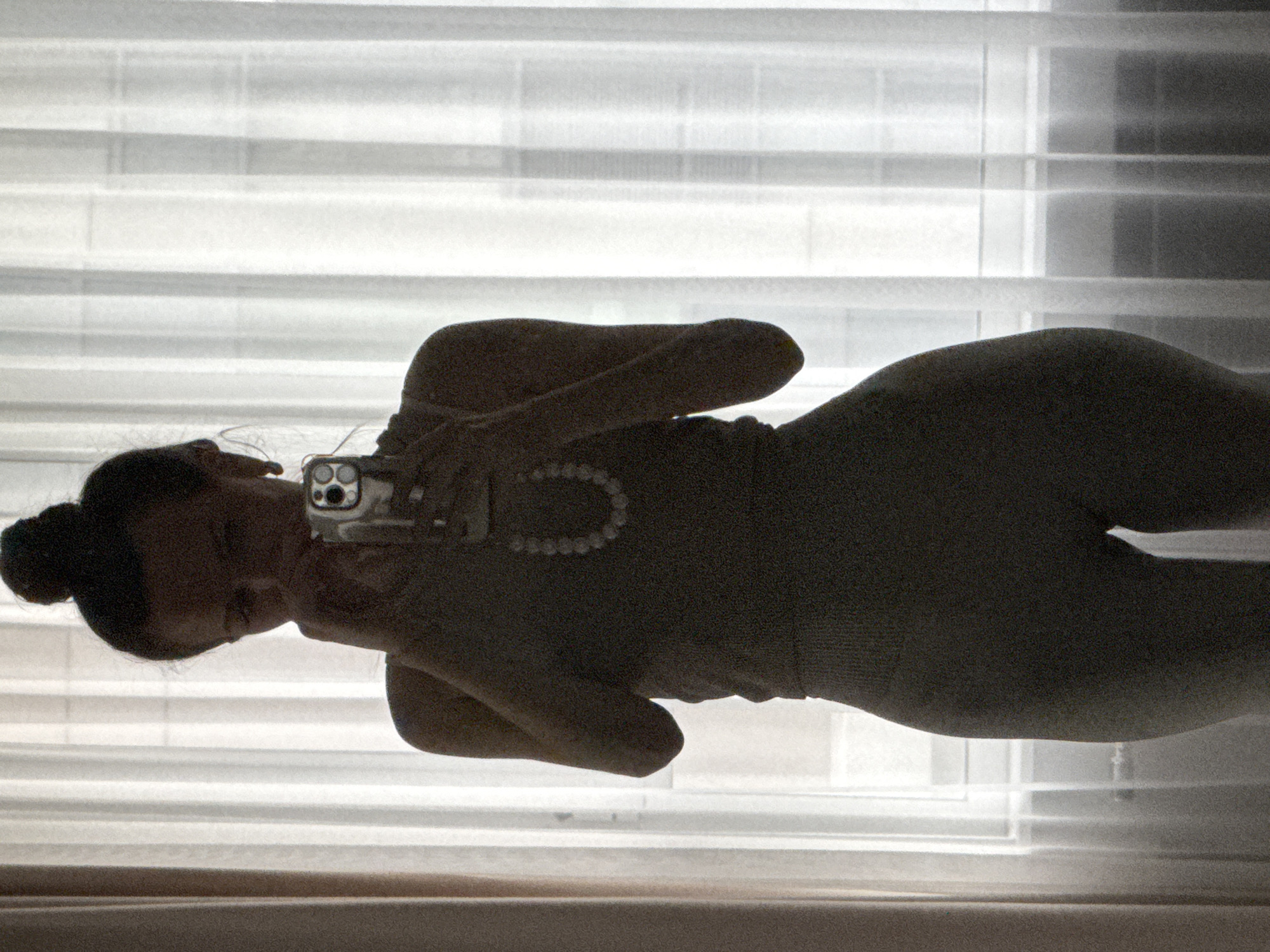 Mirror selfies captured in Khimki building during afternoon