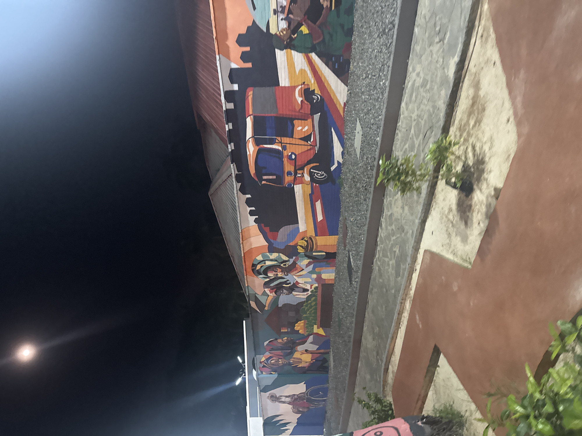 Illuminated street mural spotted in Uyo, Nigeria at night