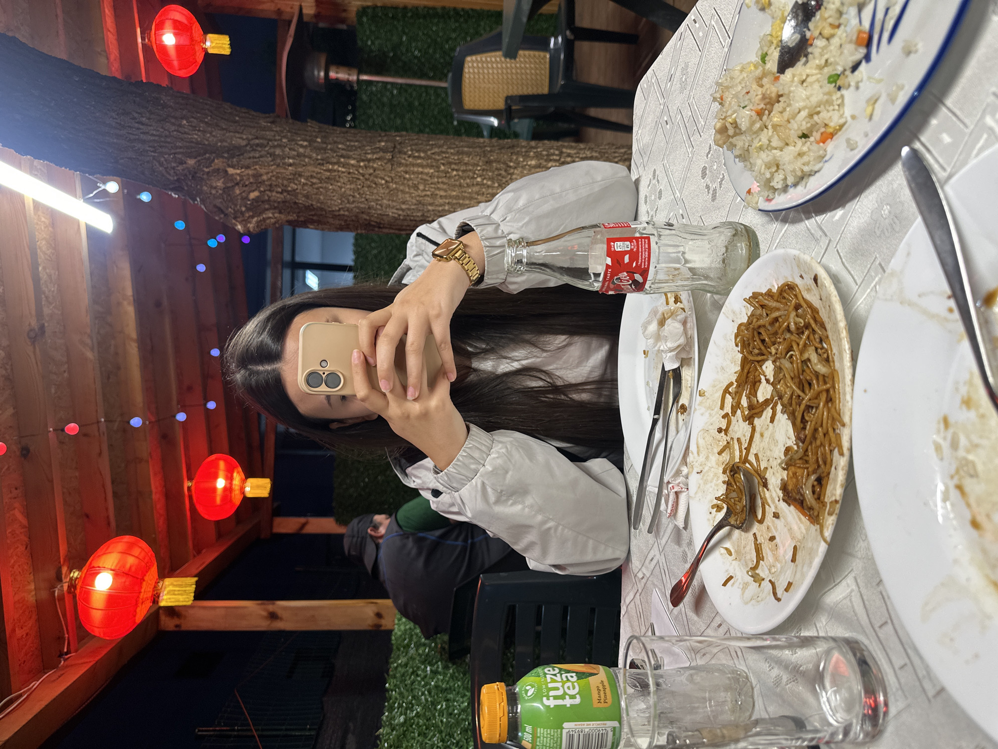 Woman dines at Asian restaurant in Sofia evening