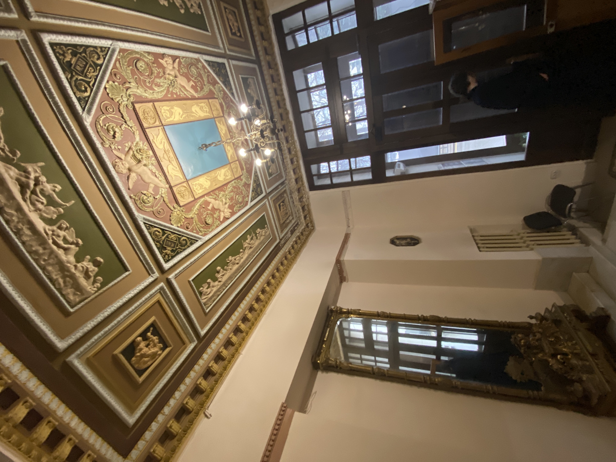 Moscow witness captures ornate building interior, rainy streets