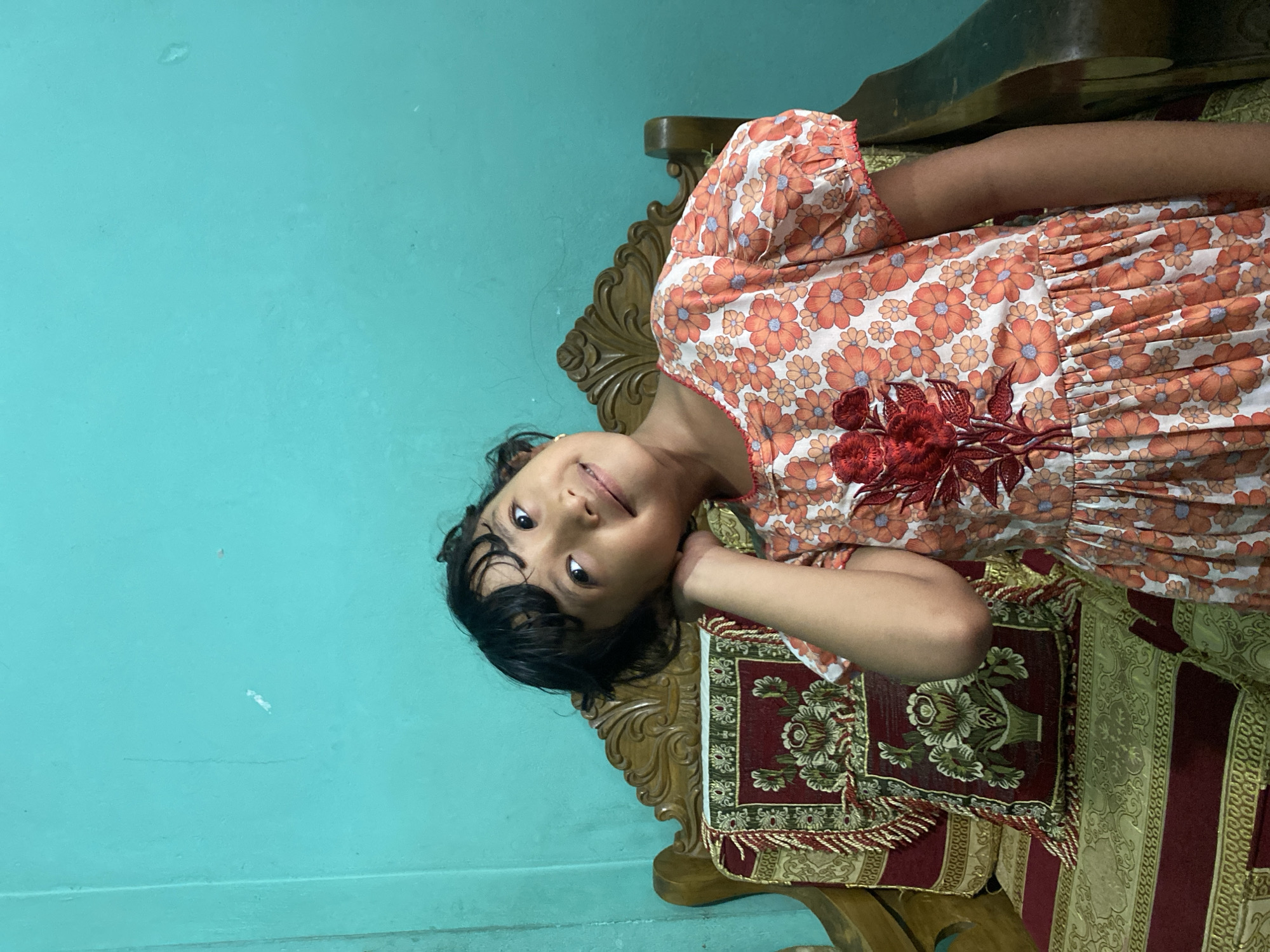 Children's playful morning moments captured in Dhaka homes