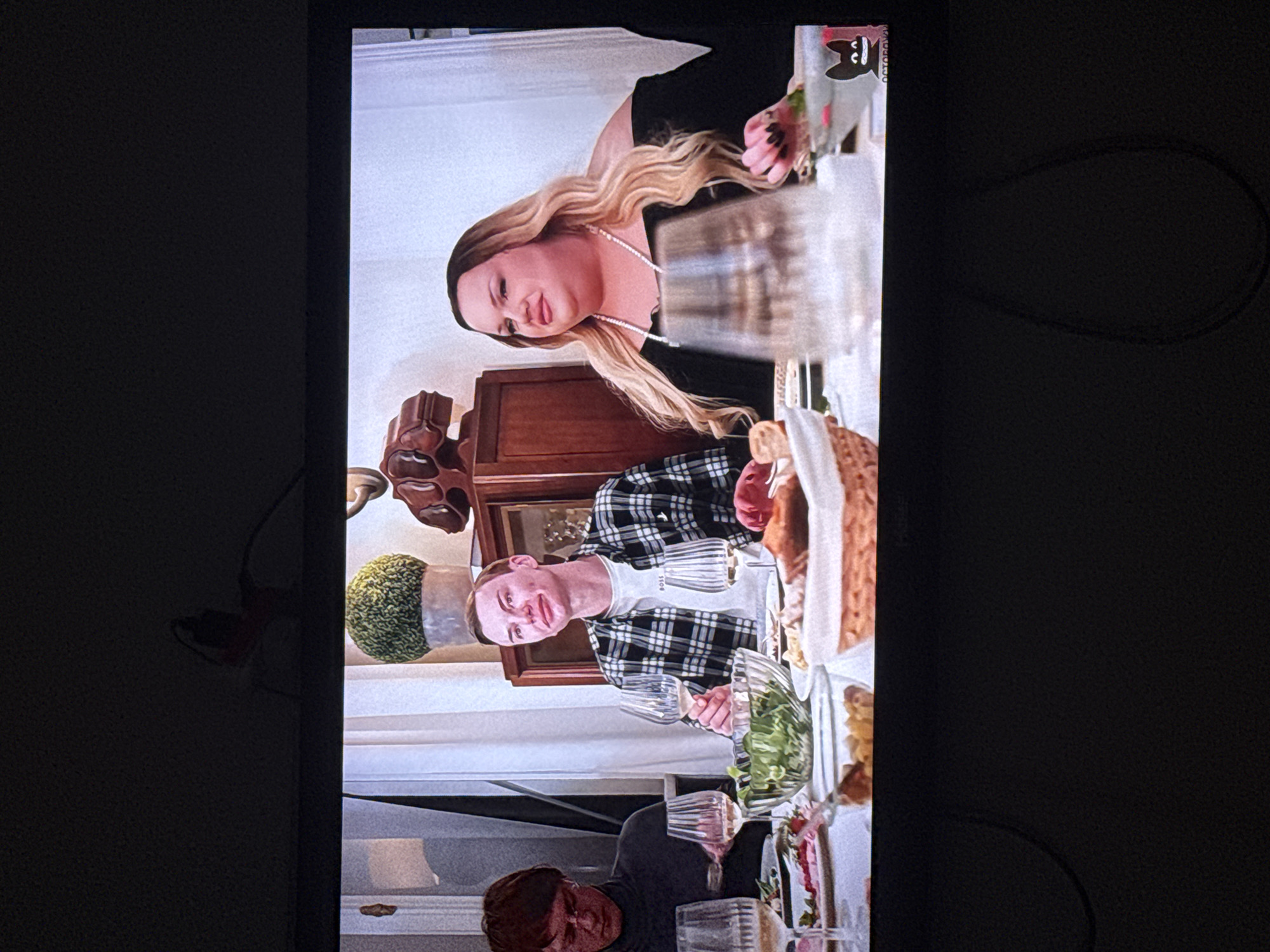 Three people dining indoors captured in Tel Aviv