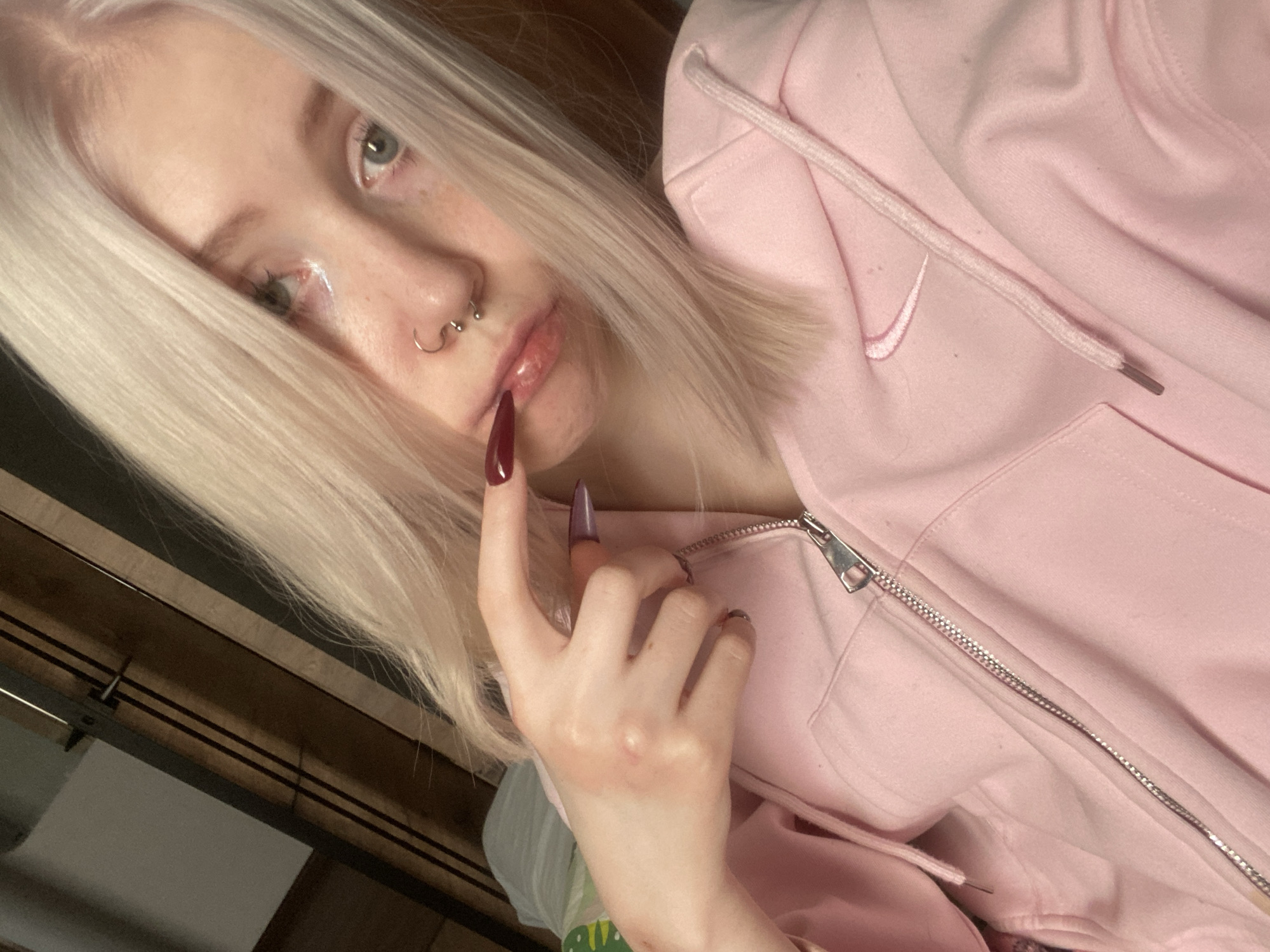 Young person photographs self in bedroom selfie session, Izhevsk