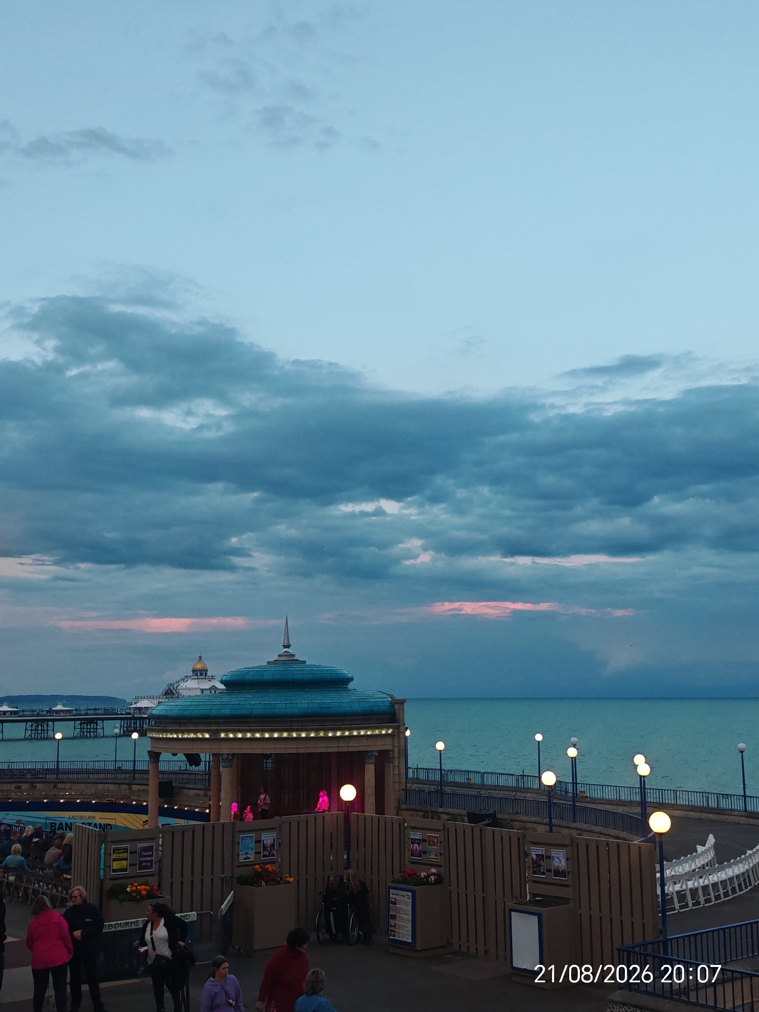 Eastbourne Bandstand at dusk under a dramatic evening sky