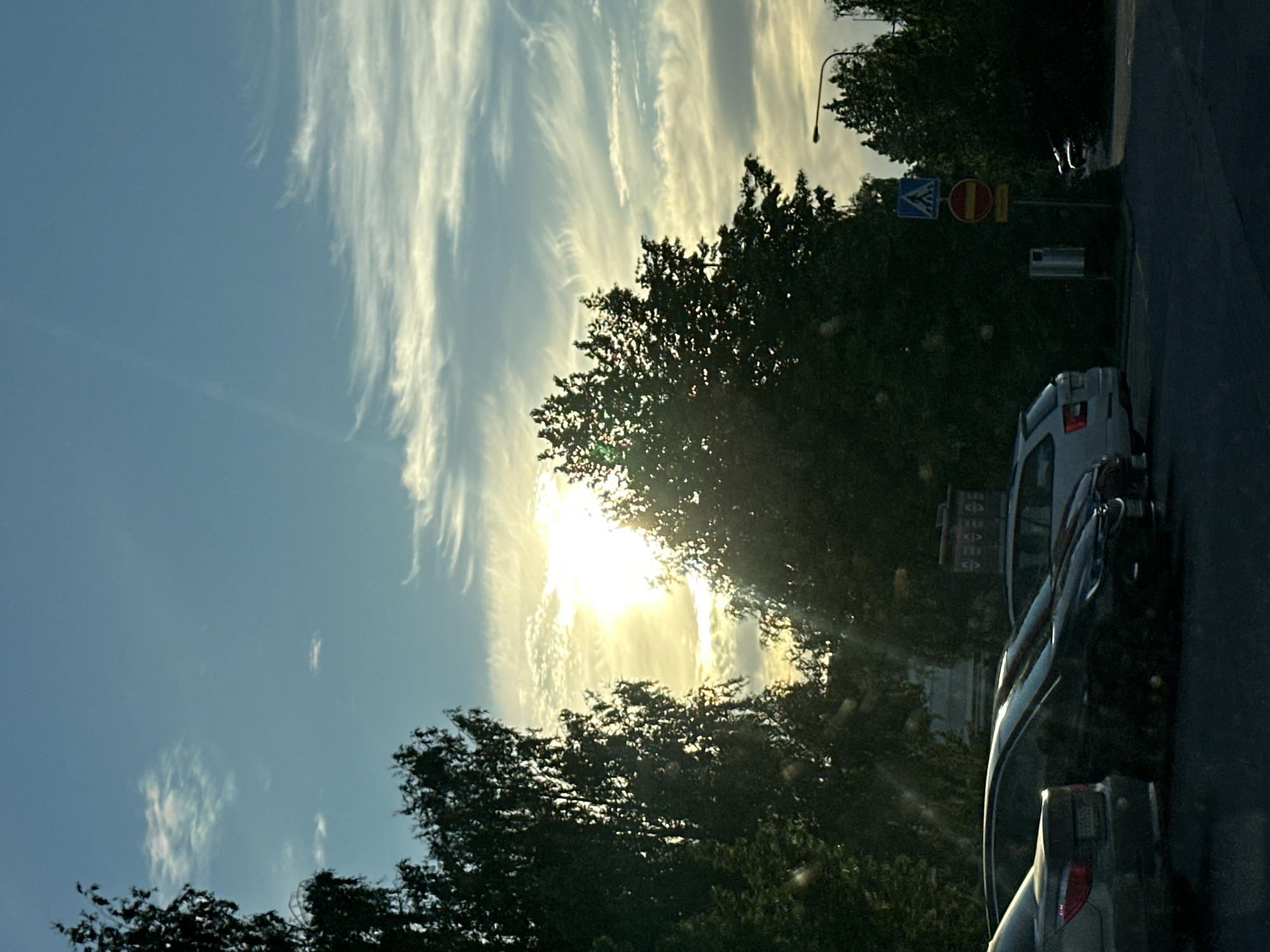 Afternoon drive through Helsinki suburbs, buses, roads, and apartment blocks