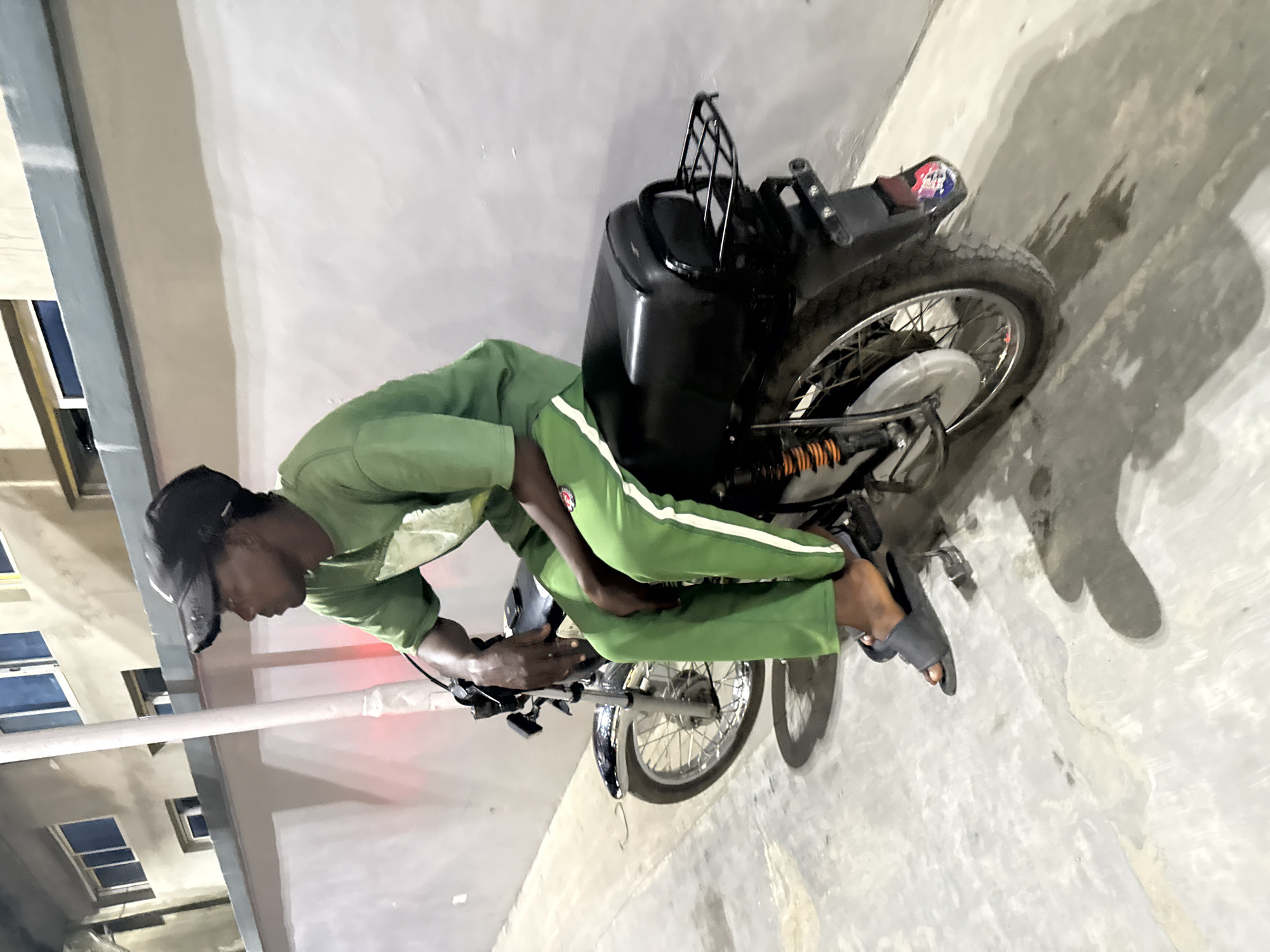 Evening street and retail life in Ado, Nigeria