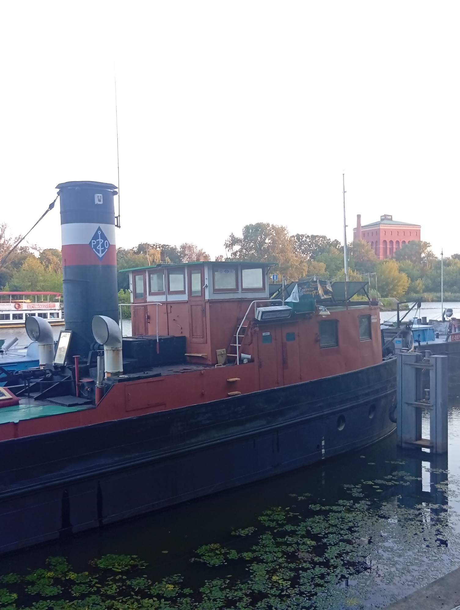 Boats, barges, and waterfront details along the Oder in Wrocław