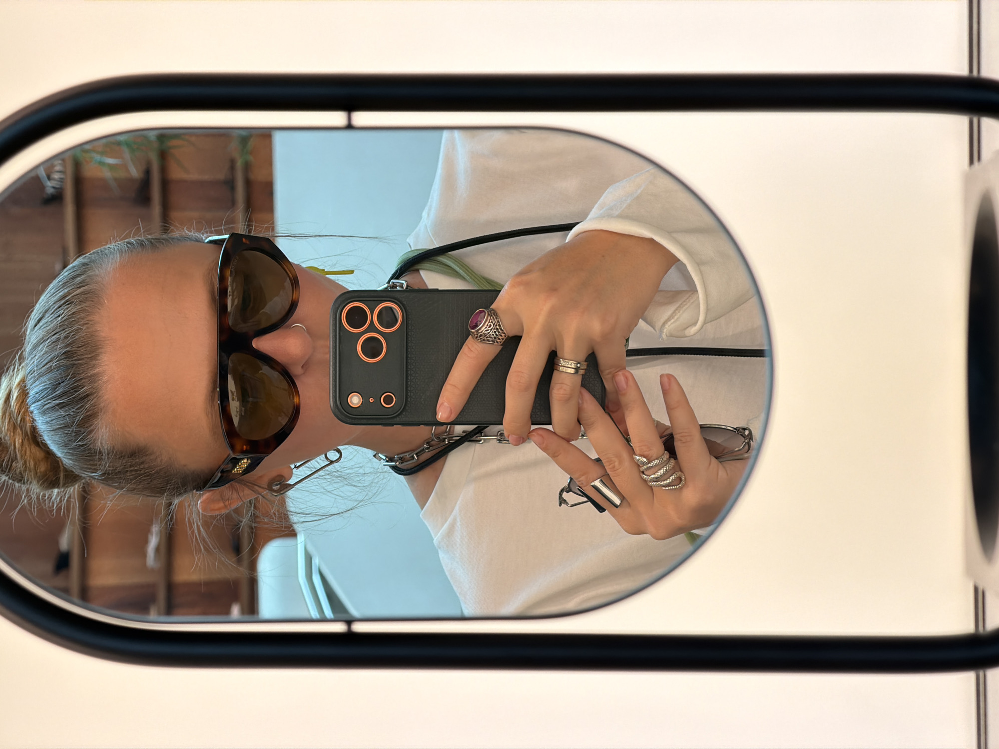 Shopper takes selfie in modern LA department store