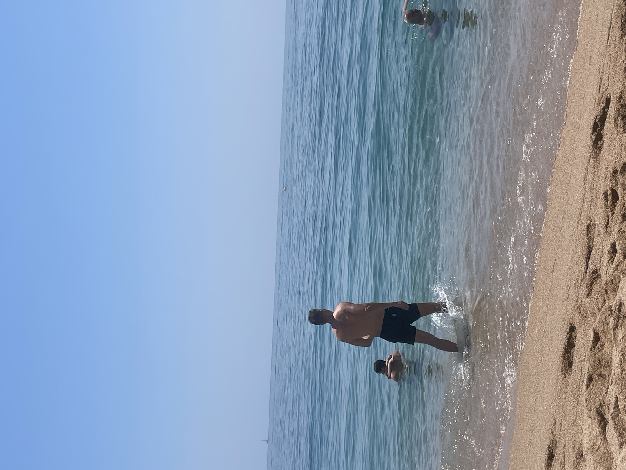 Lazy summer morning on the beach at Canet de Mar