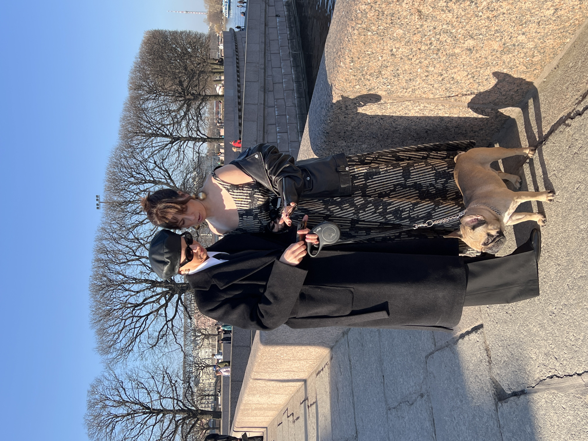 Sunny afternoon brings residents to Saint Petersburg riverfront