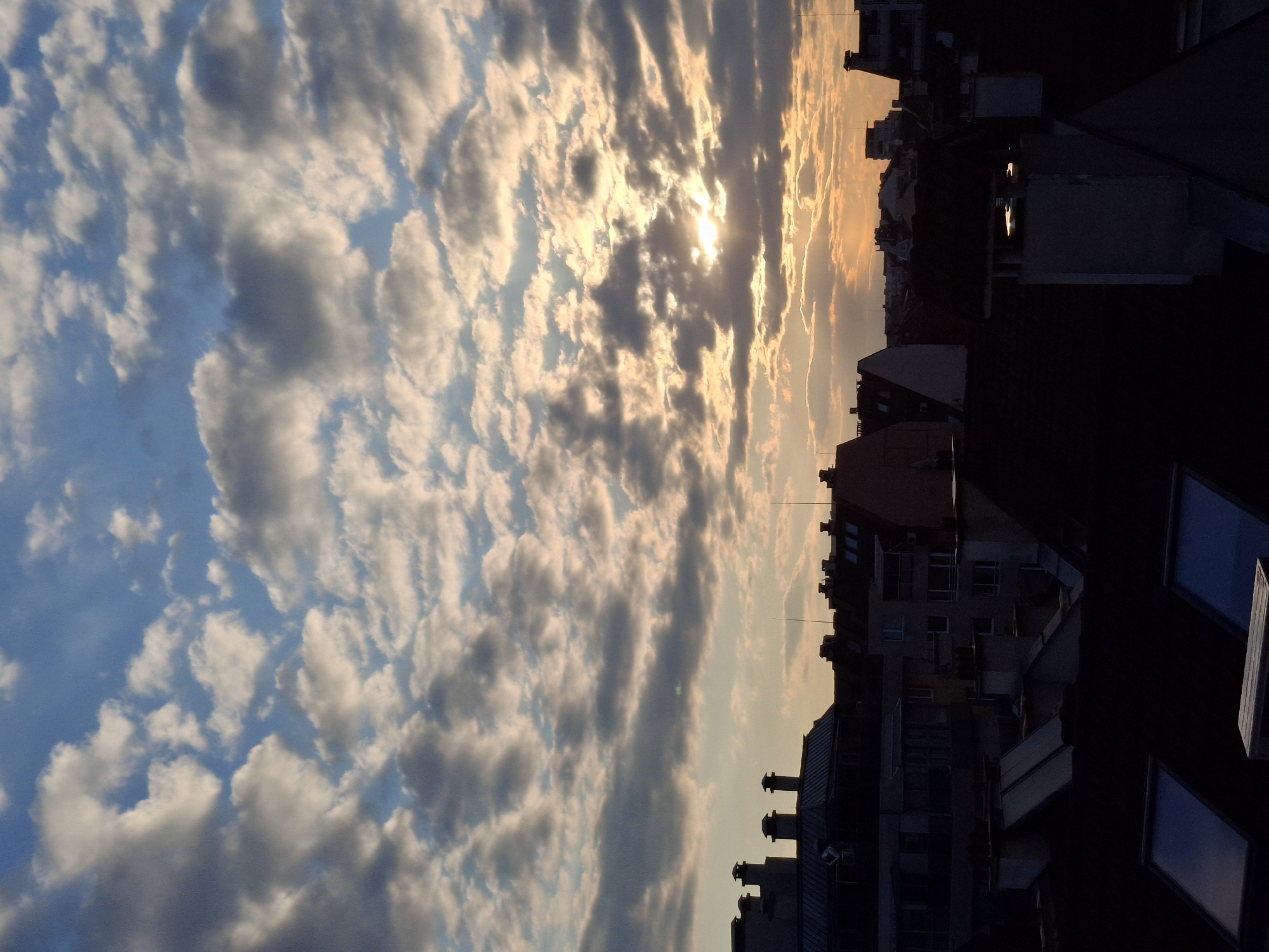 Golden sunset illuminates Sofia skyline from elevated viewpoint
