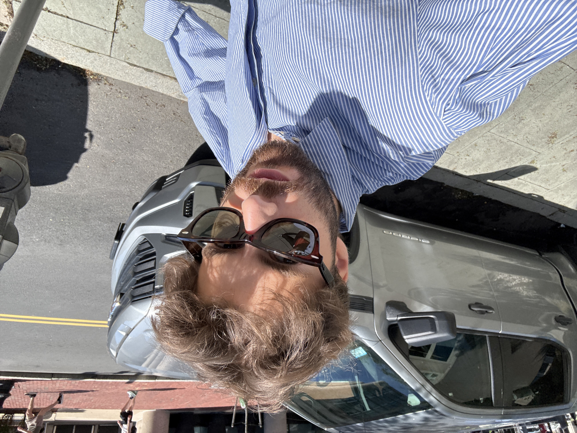 Man takes selfie with pickup truck in Boston