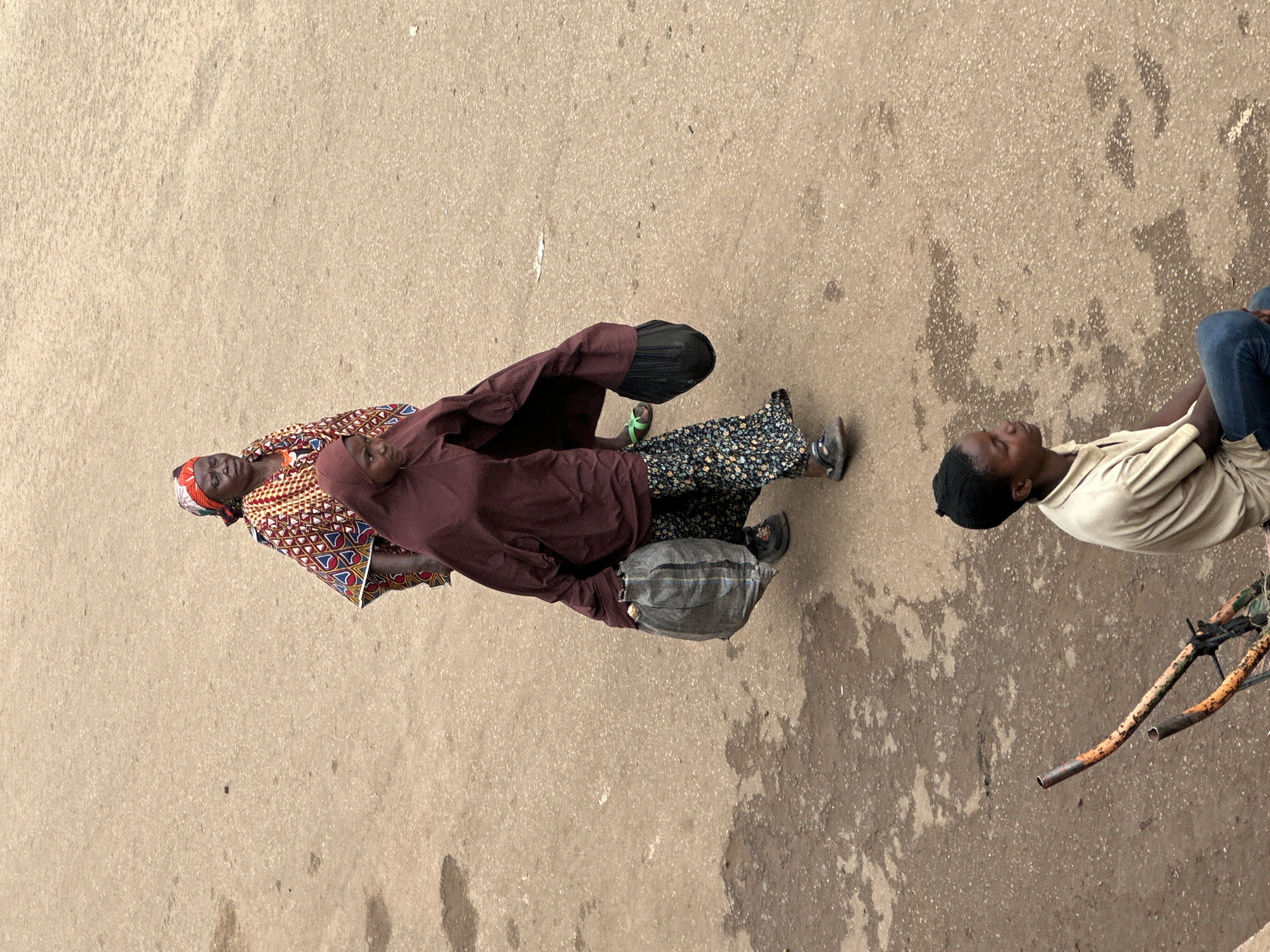 Morning street life in Bukuru, Nigeria — people, transport, trade