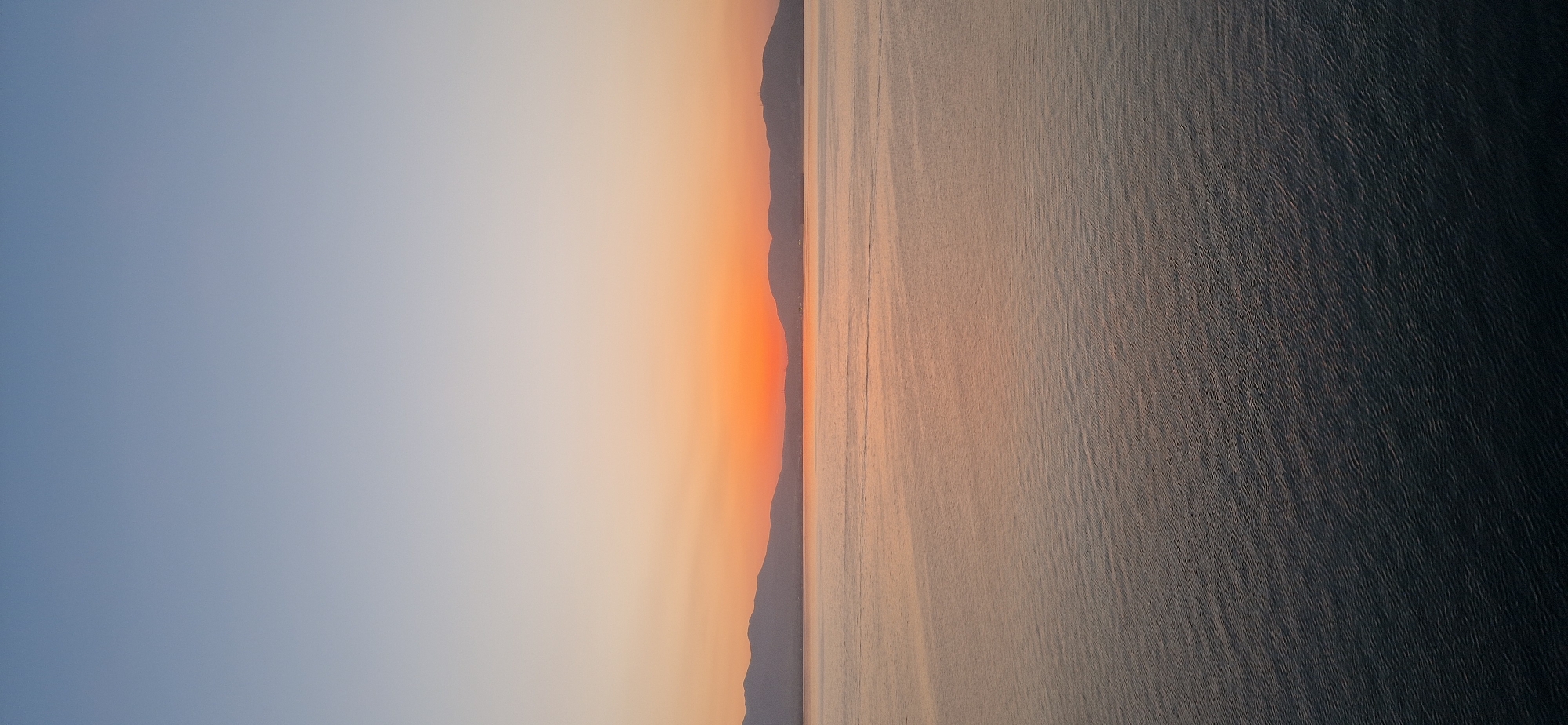 Sunset to twilight from a tanker deck off Salamina, Greece